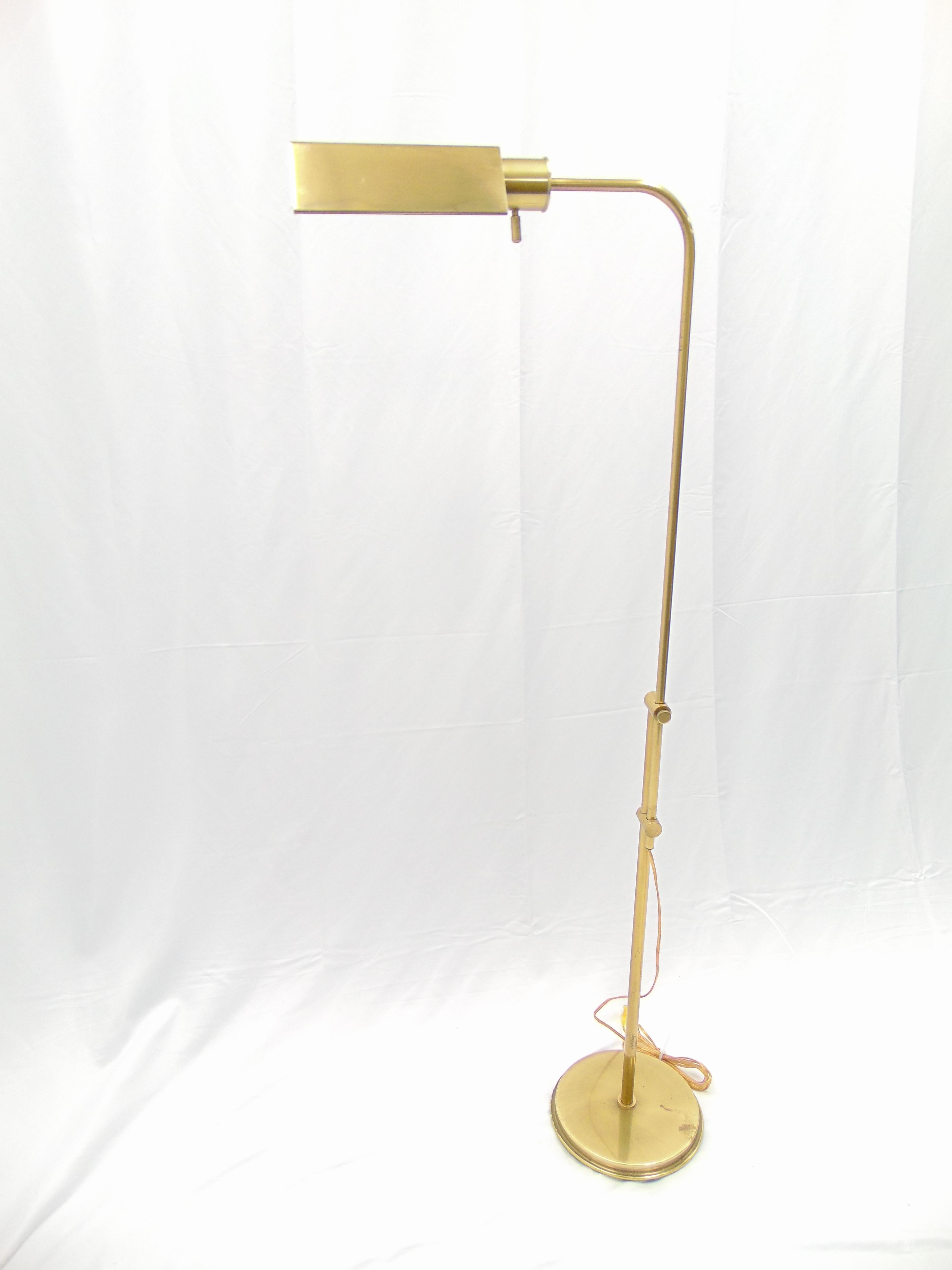 This is a beautiful vintage Frederick Cooper adjustable brass floor lamp. The lowest height it can be set at is: 36.5” and the highest is: 56.5”. The diameter of the base is 9.75.” The width across of the lamp is 19”.
