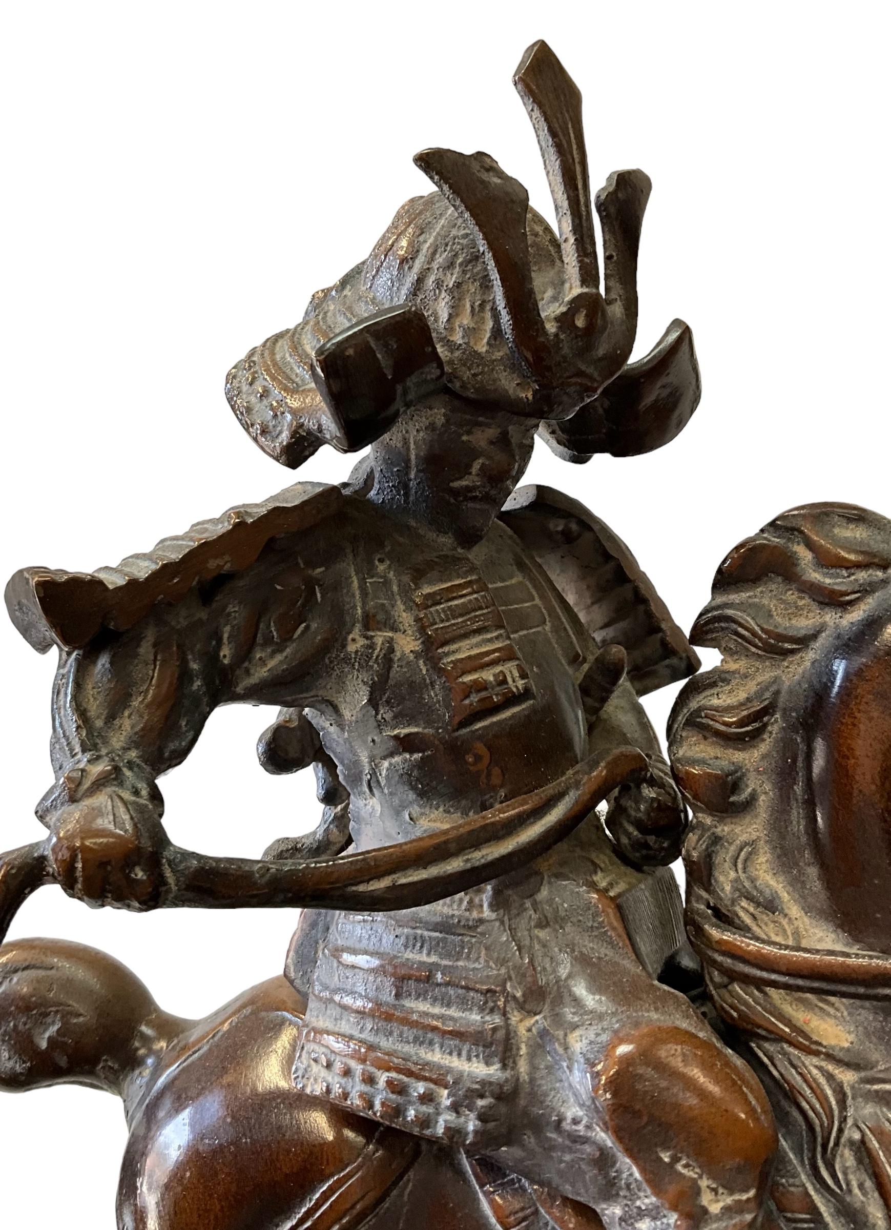 This is a 1970s cast bronze Chinese warrior on horseback table lamp by Frederick Cooper. It is such a handsome piece!  The lamp is in working order and has been tested by a professional. The base length is 11.5”. The height to the warrior’s head is