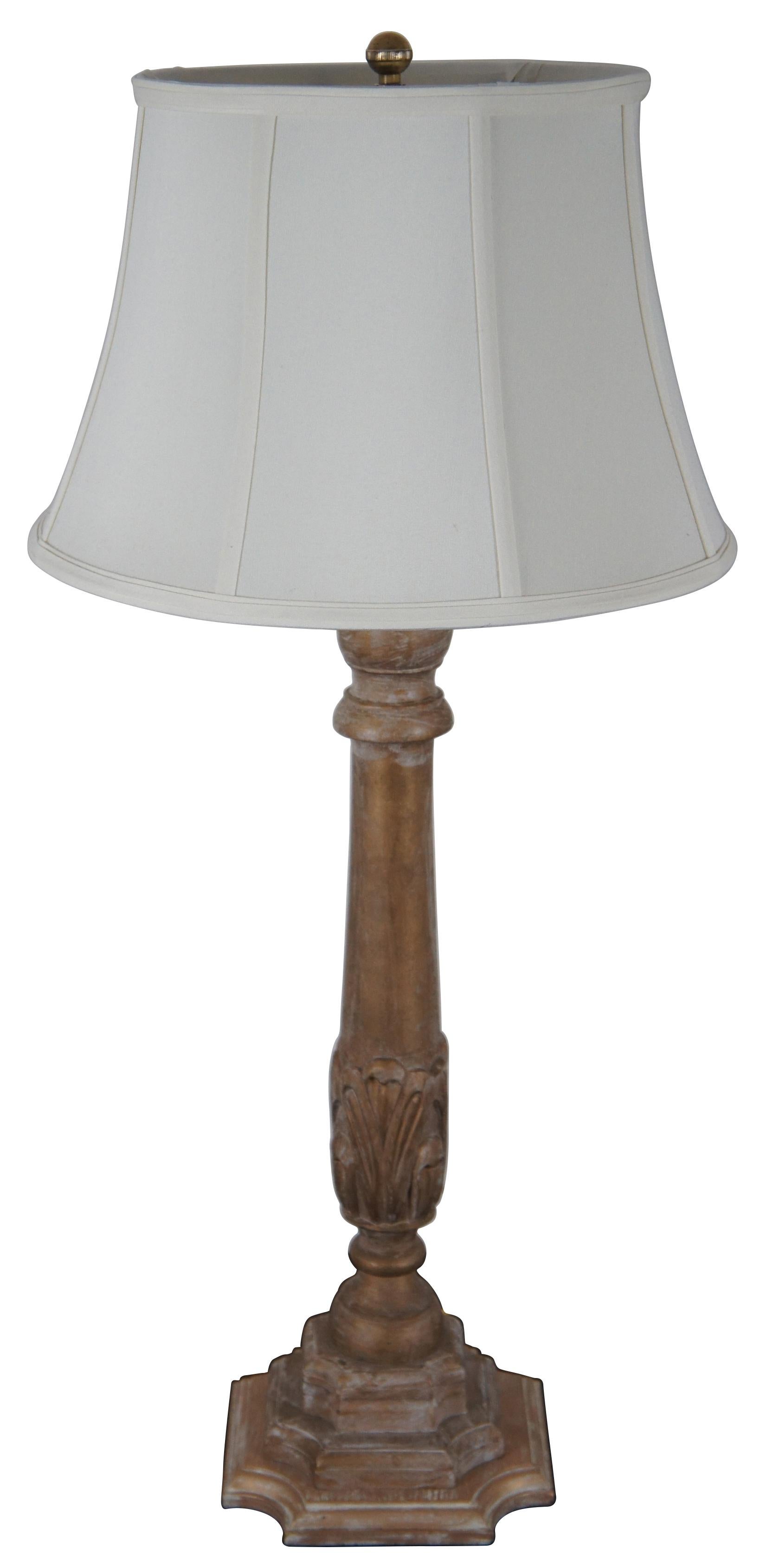 Frederick Cooper Egyptian Revival style column shaped table lamp painted in distressed gold.

Measures: 8” x 27.75” / Height to top of finial - 34.25” / shade - 16” x 10.25”.