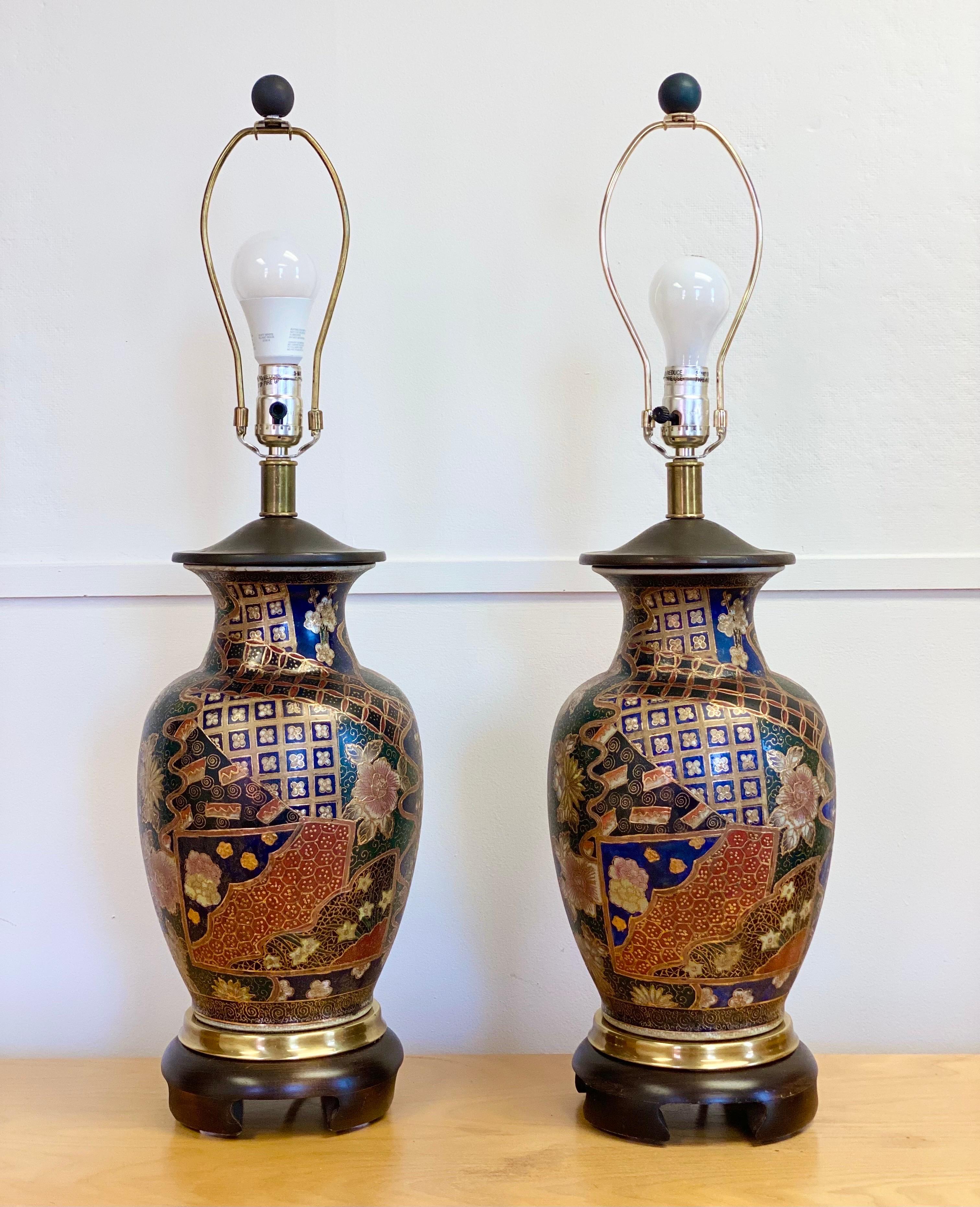 We are very pleased to offer a stunning pair of Chinese table lamps by Frederick Cooper circa the 1960s. Through mixing the media of brass, fabric, glass and wood, Cooper created exquisitely designed lamps that matched the rapid innovation of