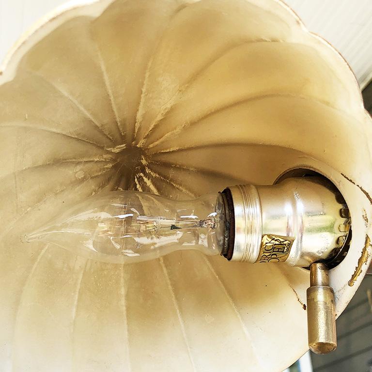 Vintage Frederick Cooper brass floor lamp with clamshell detail. This beautiful adjustable floor lamp stretches from 51