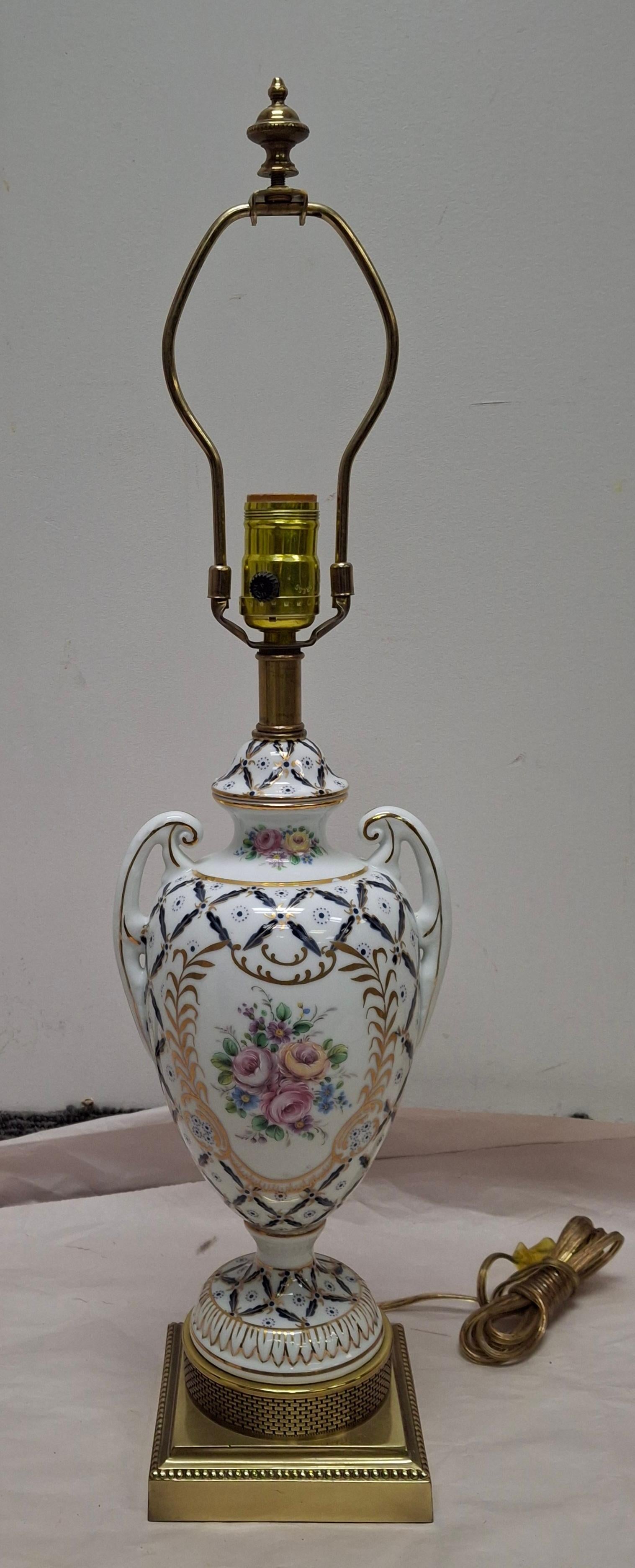 A mid 20th Century Frederick Cooper European Style Decorated Porcelain Urn Form Table Lamp.
Measures: 6