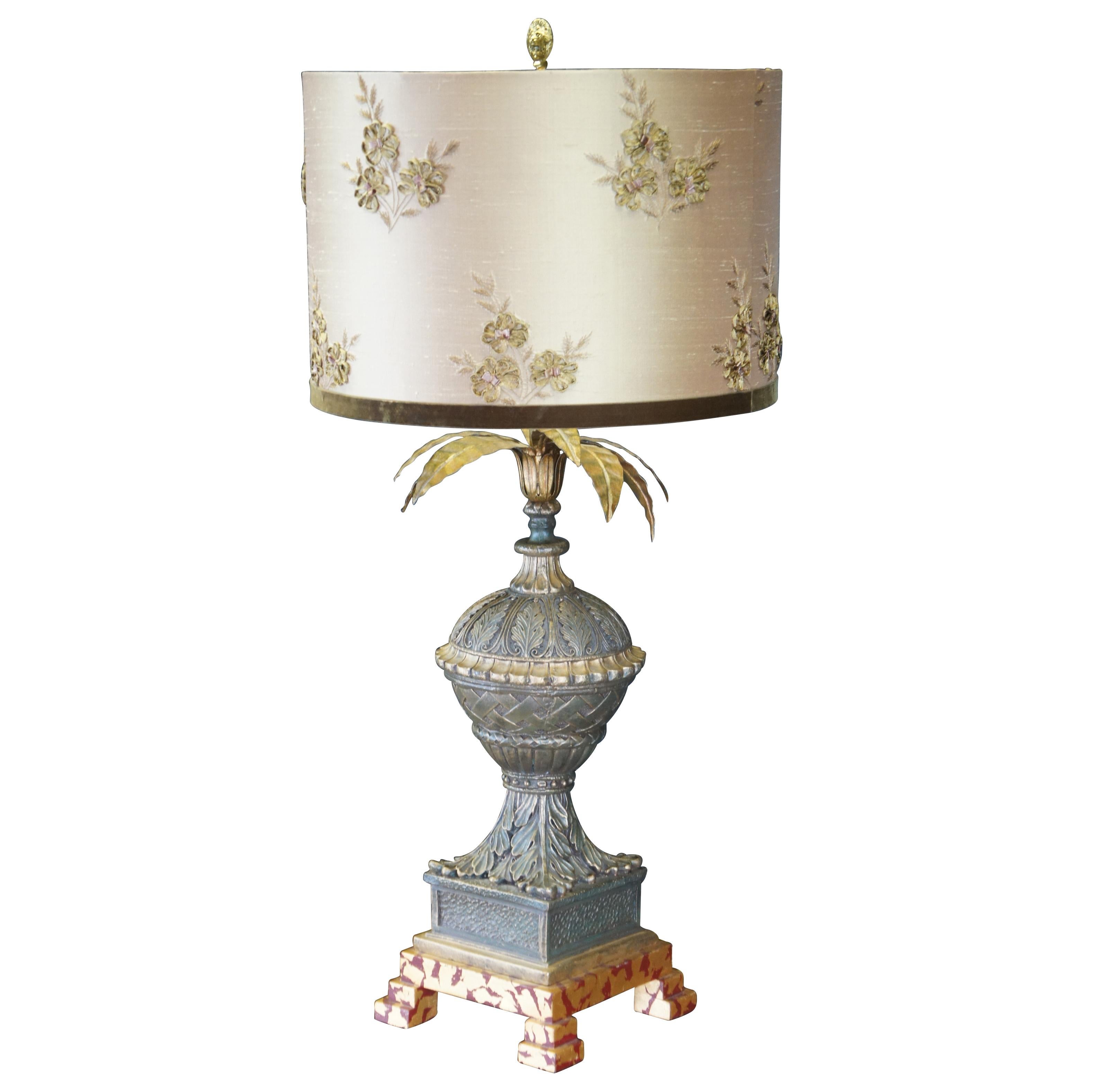 Late 20th century Frederick Cooper Buffet or table lamp.  Features an ornate base in the manner of a French urn with basketweave and acanthus design over plinth base on faux marbled footer.  The lamp has a pineapple leave topper and ornate silk drum