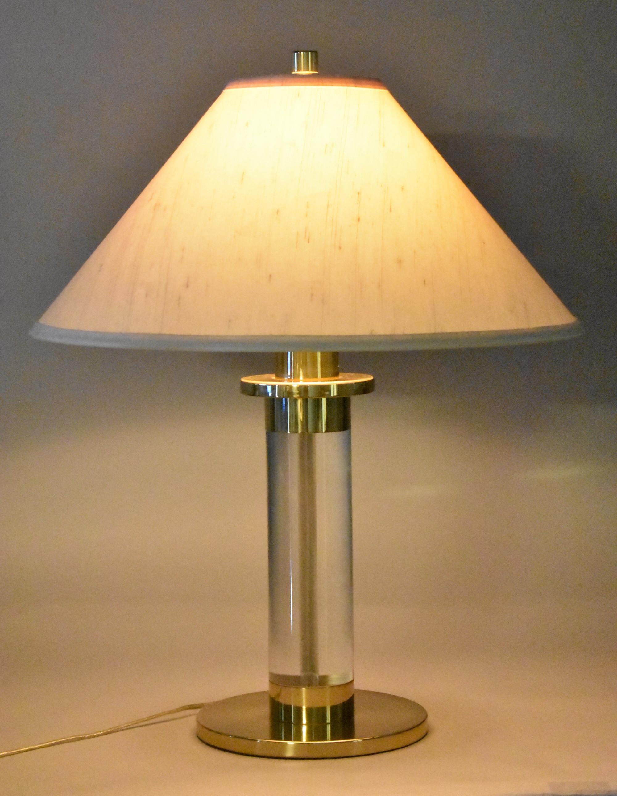 Frederick Cooper Lucite and brass cylinder table lamp. Original finial. Shade is marked F Cooper Lamps.