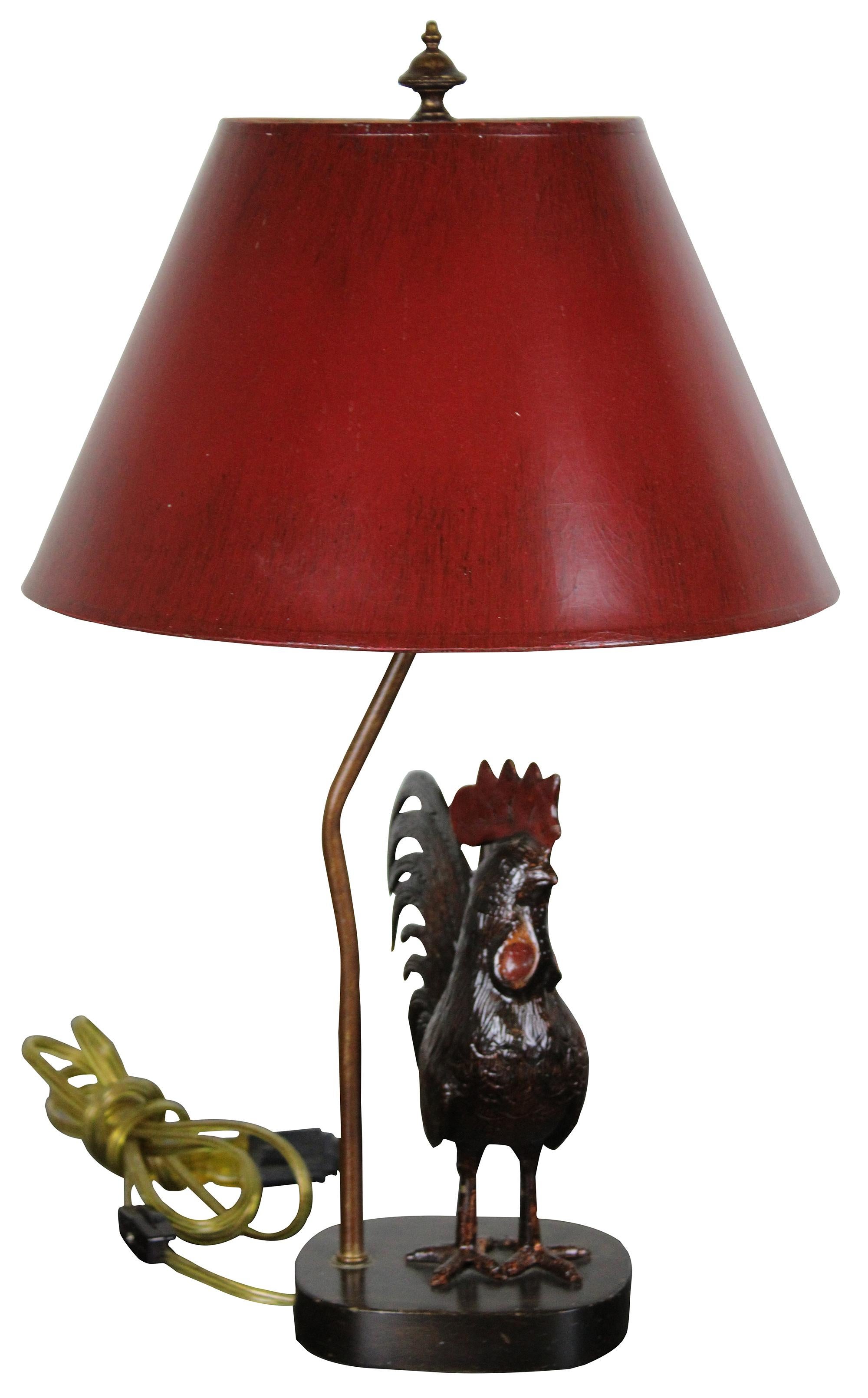 Frederick Cooper metal rooster lamp. Features a stylized rooster over base and red shade. Measures: 20