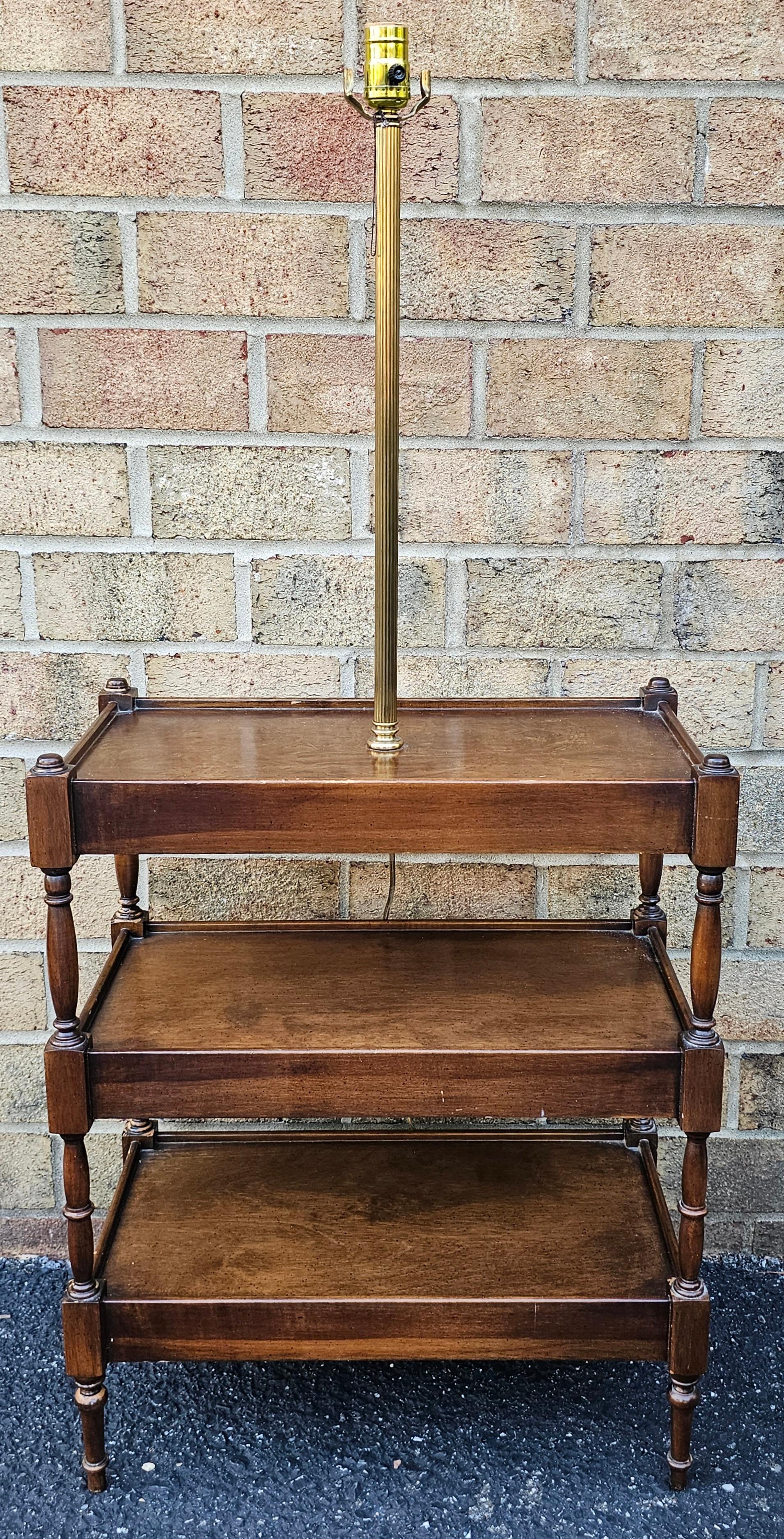 A Mid 20th Century Frederick Cooper Three-Tier Walnut Side Table Floor Lamp. Measures 21
