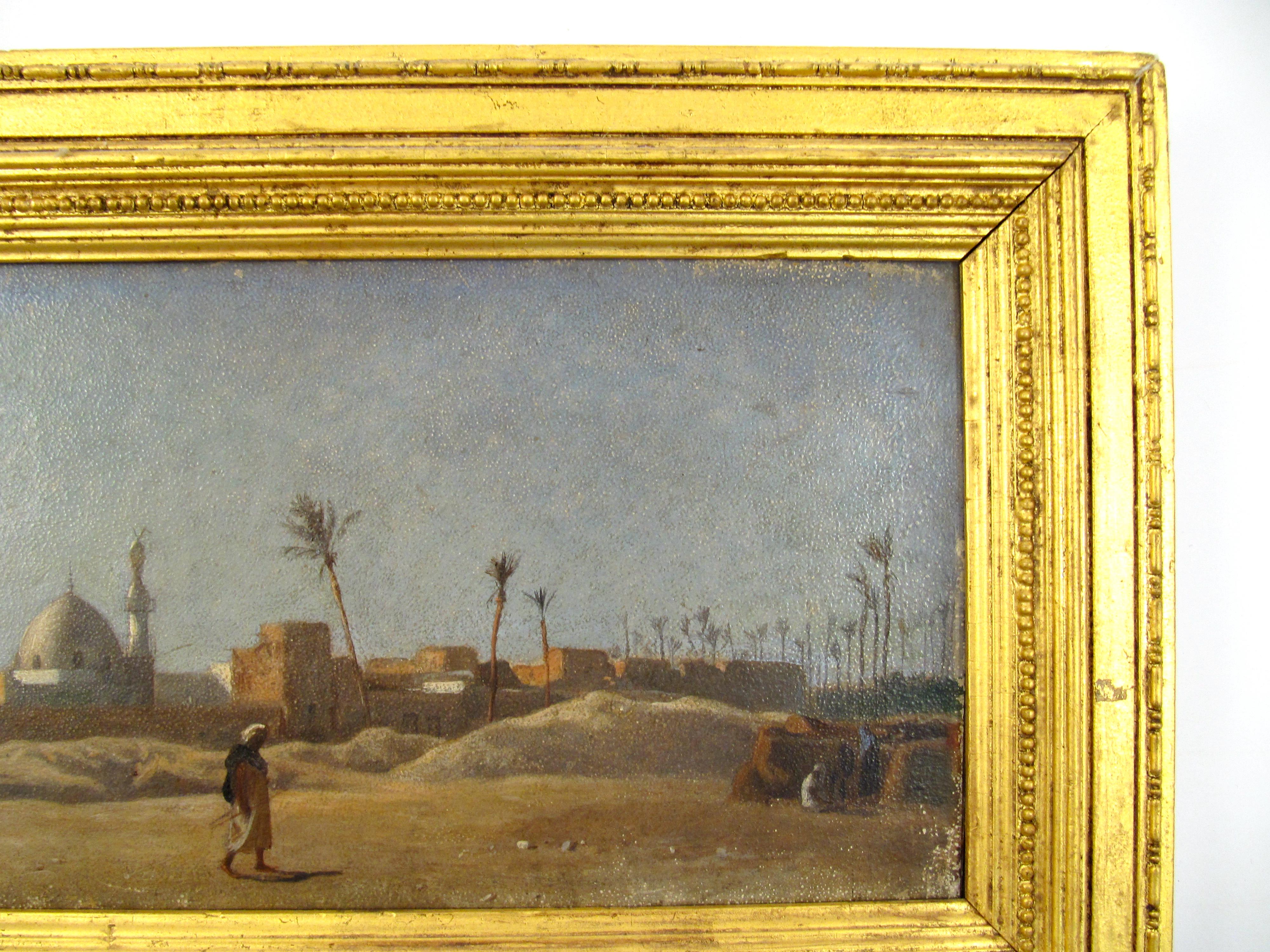 Frederick Goodall RA (English, 1822 - 1904)

A Desert Village with mosque at Midday in Egypt, North Africa

•	Oil on paper laid on canvas ca. 17 x 38 cm
•	Original frame ca. 27 x 47 cm
�•	Monogramed lower left

A small village dominated by a domed