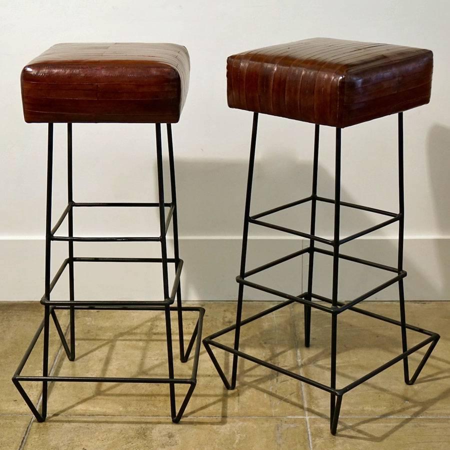 Frederick Weinberg EEL skin stools.
Pair of wrought iron and EEL skin bar stools,
circa 1970s.
Measure: Seat 14