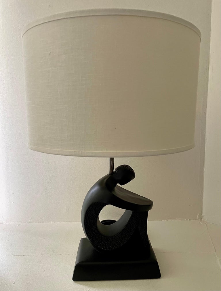 Very cool black sculptural small table lamp by Frederick Weinberg for FAIP, 1950's
Professionally restored and rewired. Shade not included.