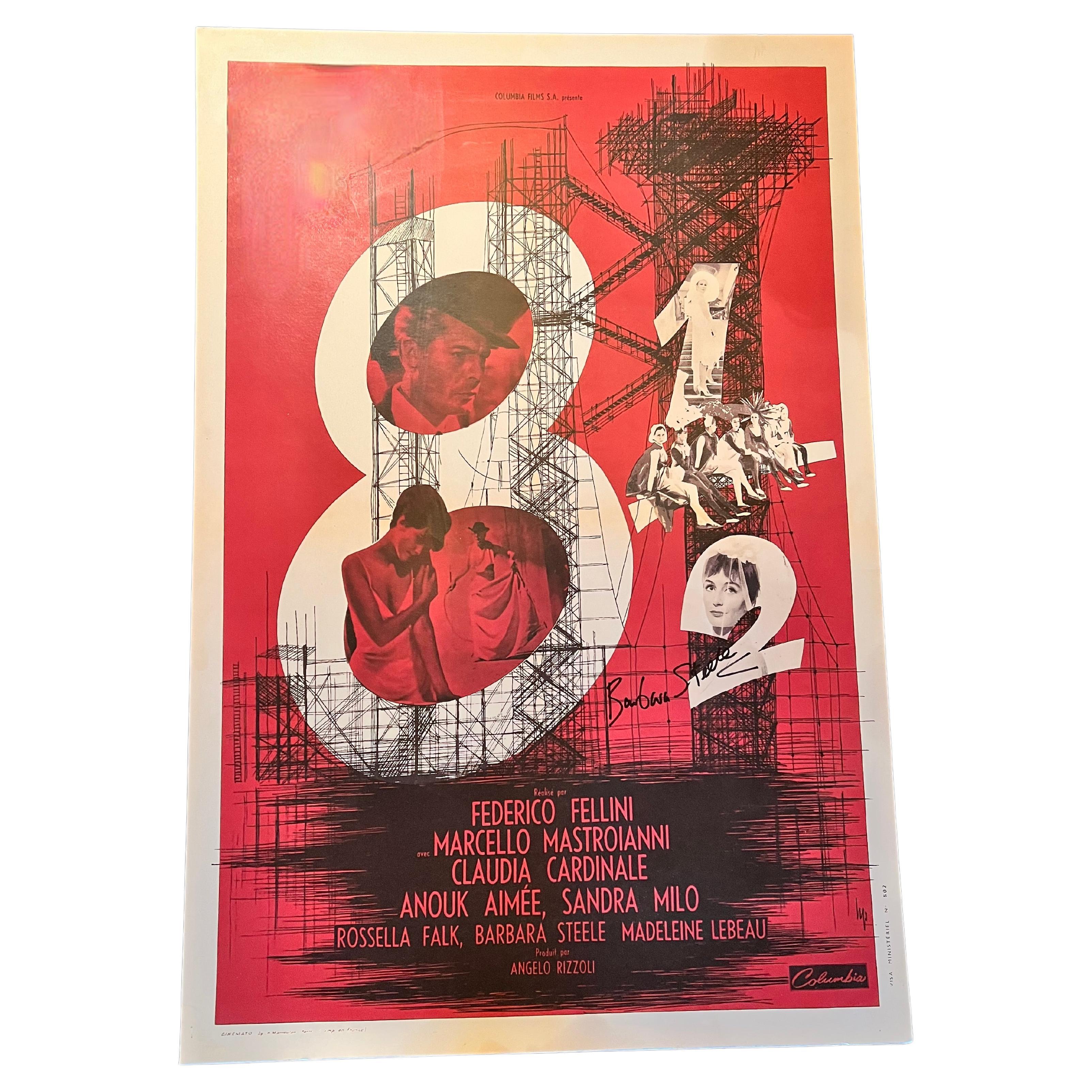 Federico Fellini 8 1/2 movie poster signed by one of the stars and cast, Barbara Steele. The poster, is a print of one of the original posters from the 1963 film. the poster is not orignina. The poster is in good condition and mounted on 1/4