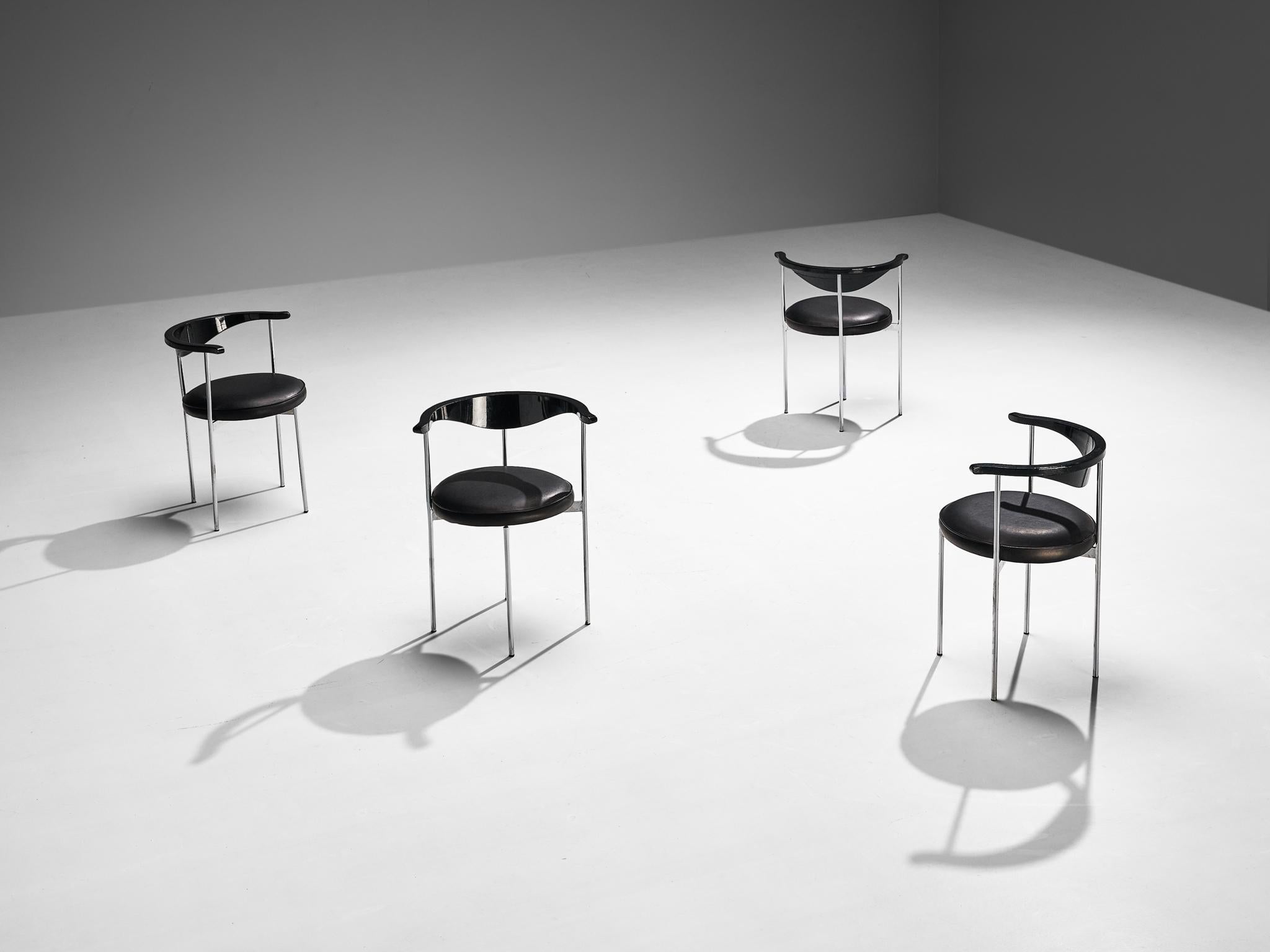 Frederik Sieck for Fritz Hansen, pair of chairs model 3200, skai, black lacquered wood, metal, Denmark, design 1962

This industrial set of four chairs was designed by the Swedish designer Frederik Sieck for Fritz Hansen. The round chair has a
