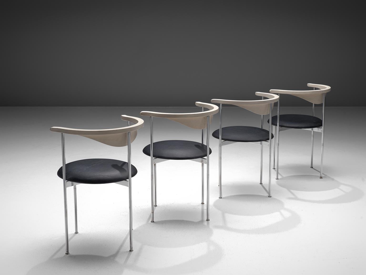 Frederik Sieck, four chairs, black skai, metal, white wood, Denmark, design 1962, execution 1967.

These industrial clear set of the model 3200 chairs were designed by the Swedish Frederik Sieck for Fritz Hansen. The round chair has a classic