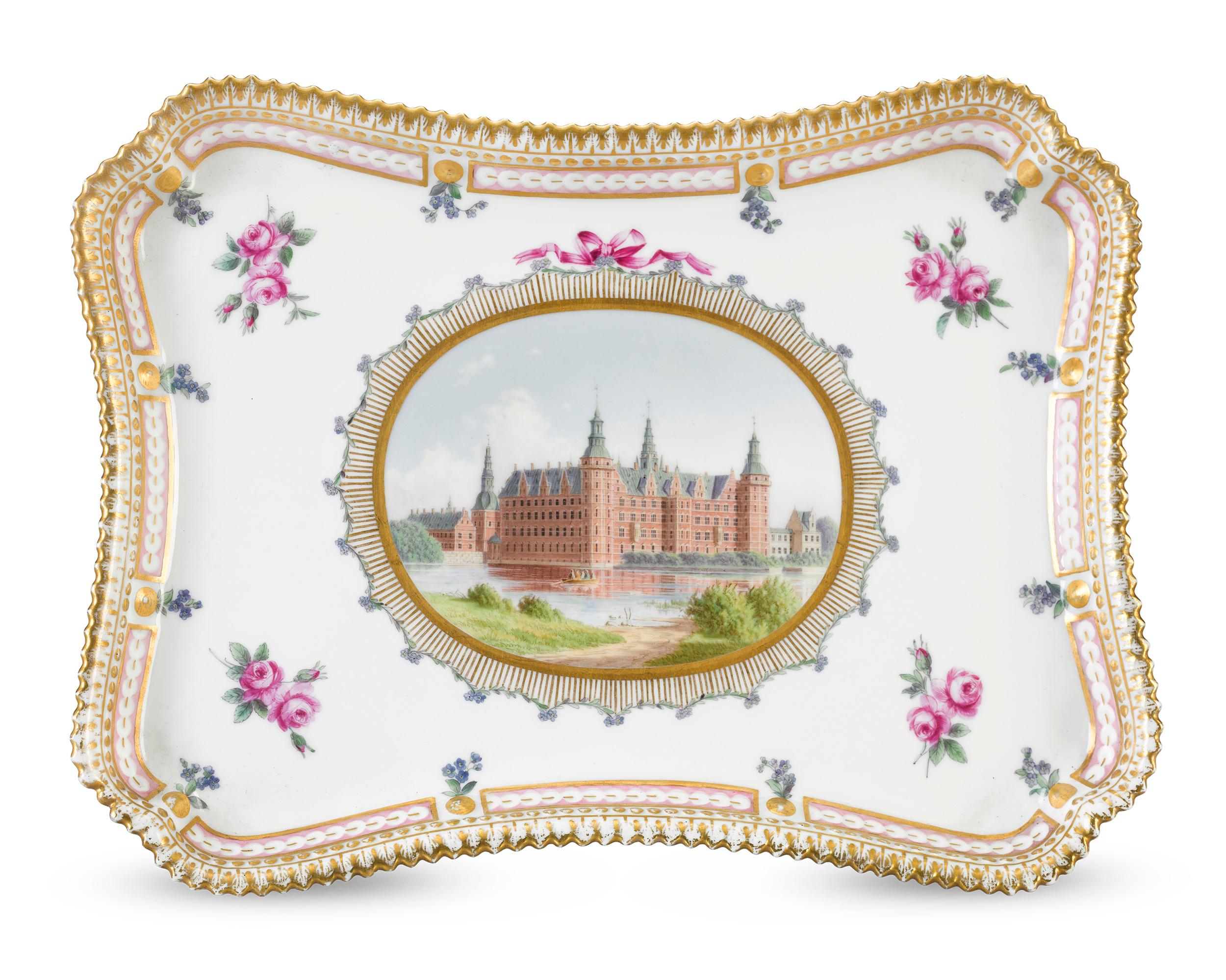 This exceptional porcelain tray captures the palatial facade of Frederiksborg castle in Denmark. Built by King Christian IV in the early 17th century, the world-famous Frederiksborg castle is the largest and most impressive Renaissance palace in the