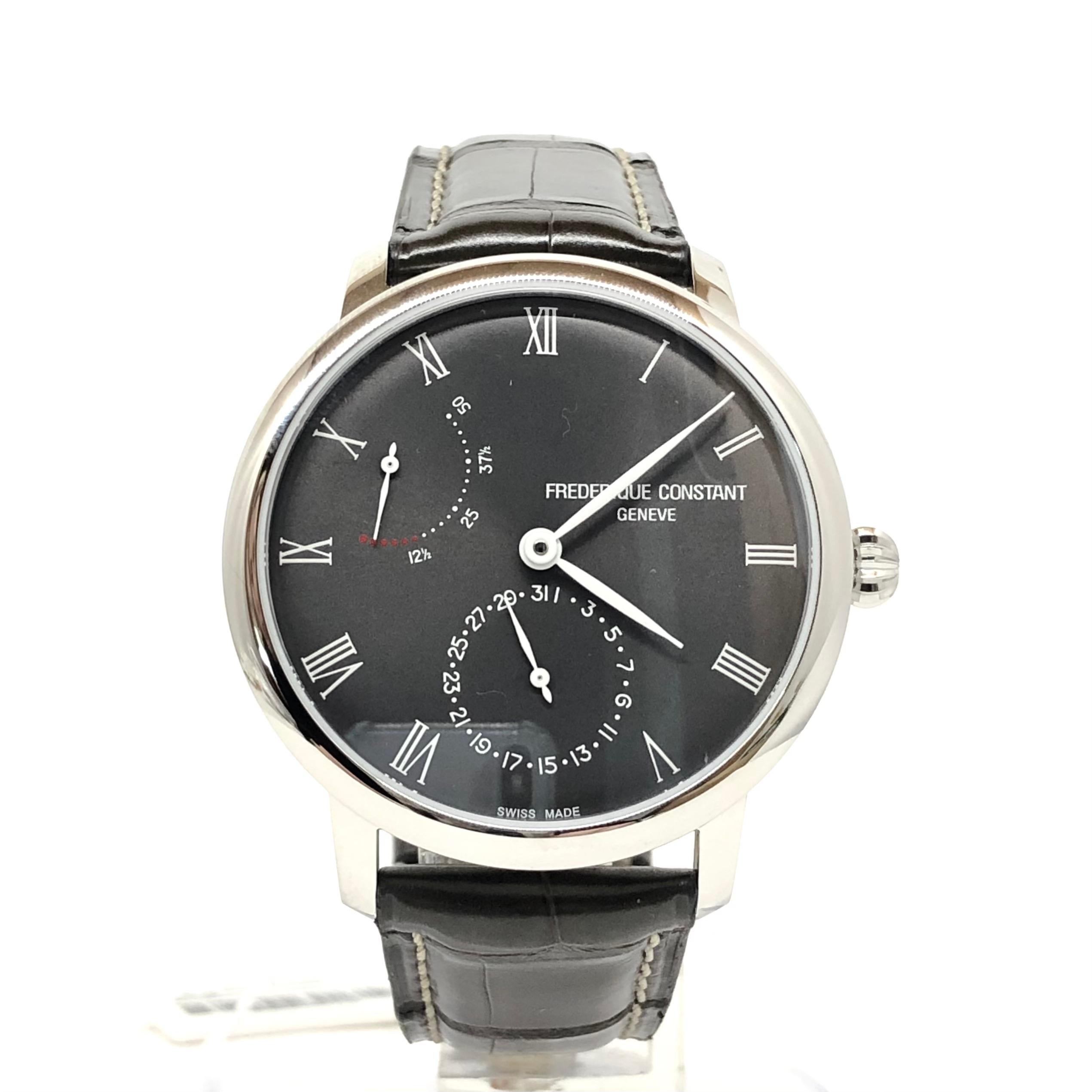This Men’s watch has a 40 mm round stainless steel case with fixed bezel. Dark grey dial with and silver-tone leaf-style shape hands & Roman numerals hour markers. The date display at 6 o’clock and the power reserve indicator at 10 o’clock position.