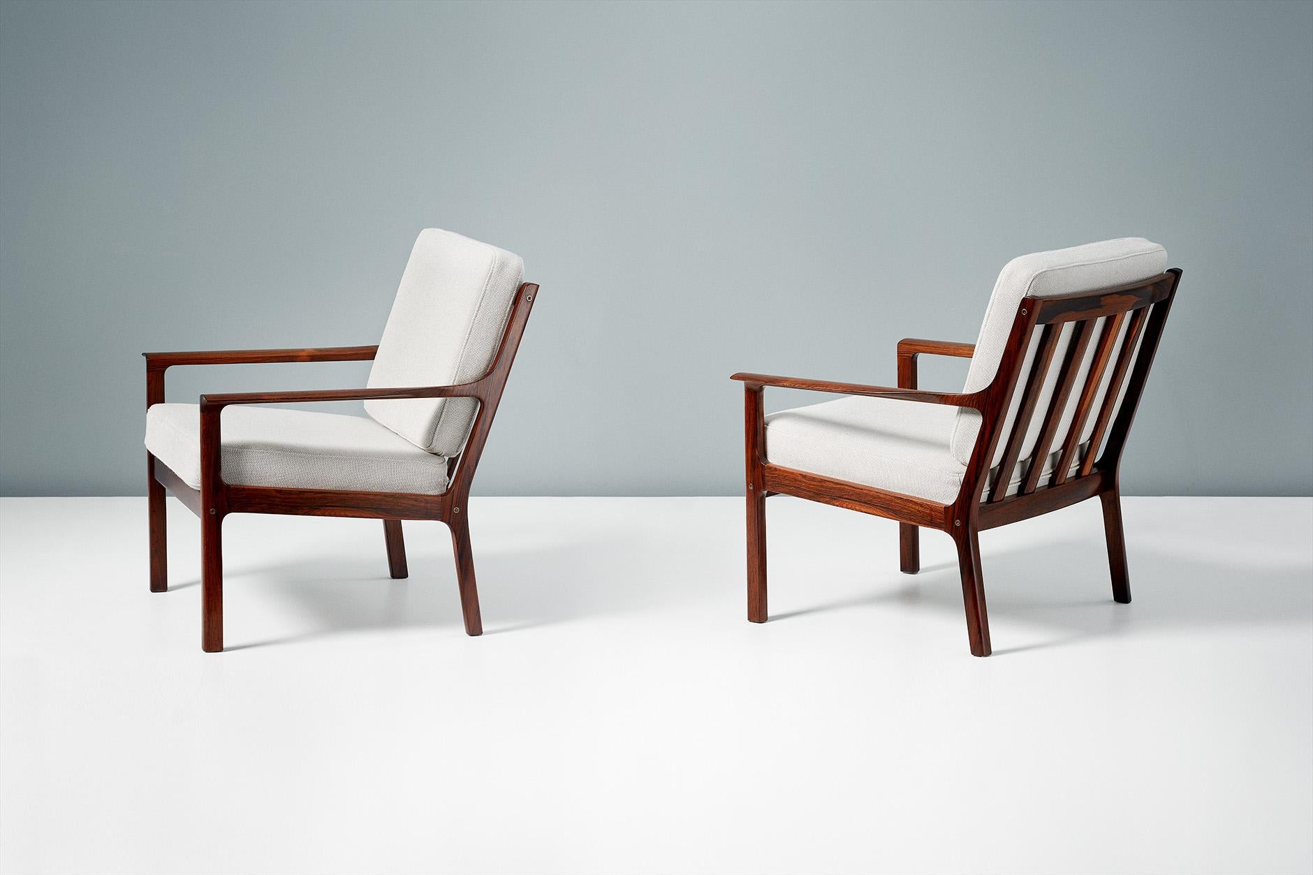 Fredrik Kayser

Model 935 lounge chairs

Produced by Vatne Mobler in Norway, circa 1960s. The frames are made from highly figured Brazilian rosewood. The new cushions are upholstered in Kvadrat wool fabric. 

Measures: W 69cm / D 71cm / H 79cm.