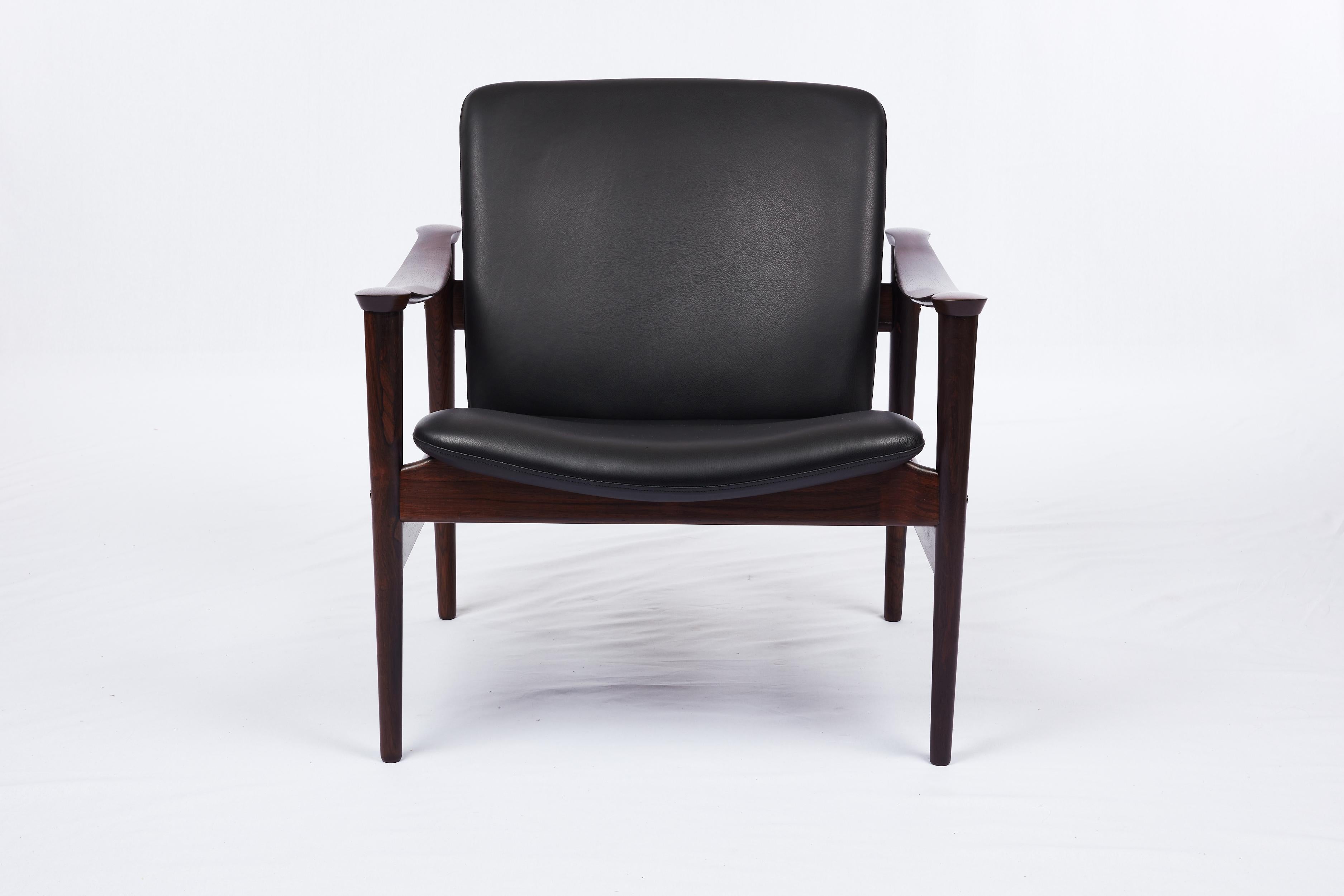 Fredrik Kayser rosewood lounge chair designed in 1961 and Produced by Vatne.
