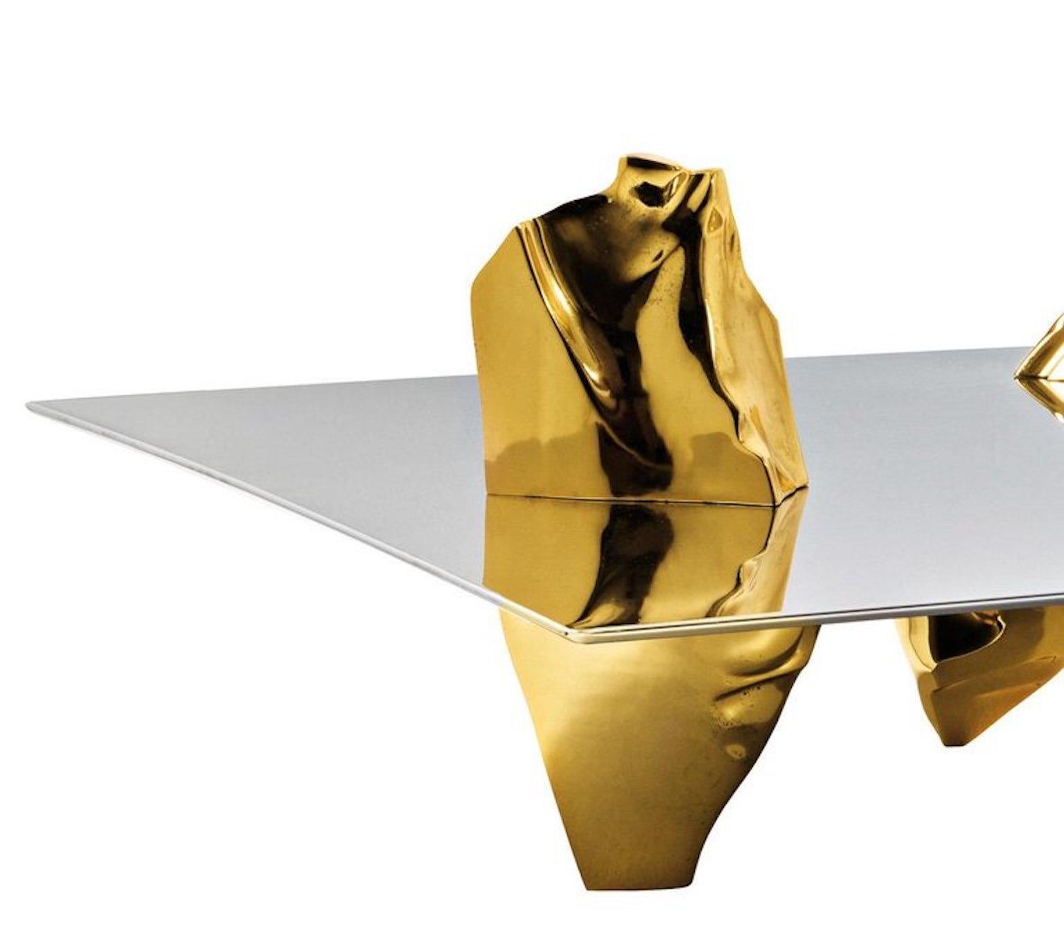 Coffee table/sculpture legs in polished cast aluminum gold-plated finished and MDF top with mirror polished stainless steel coating.