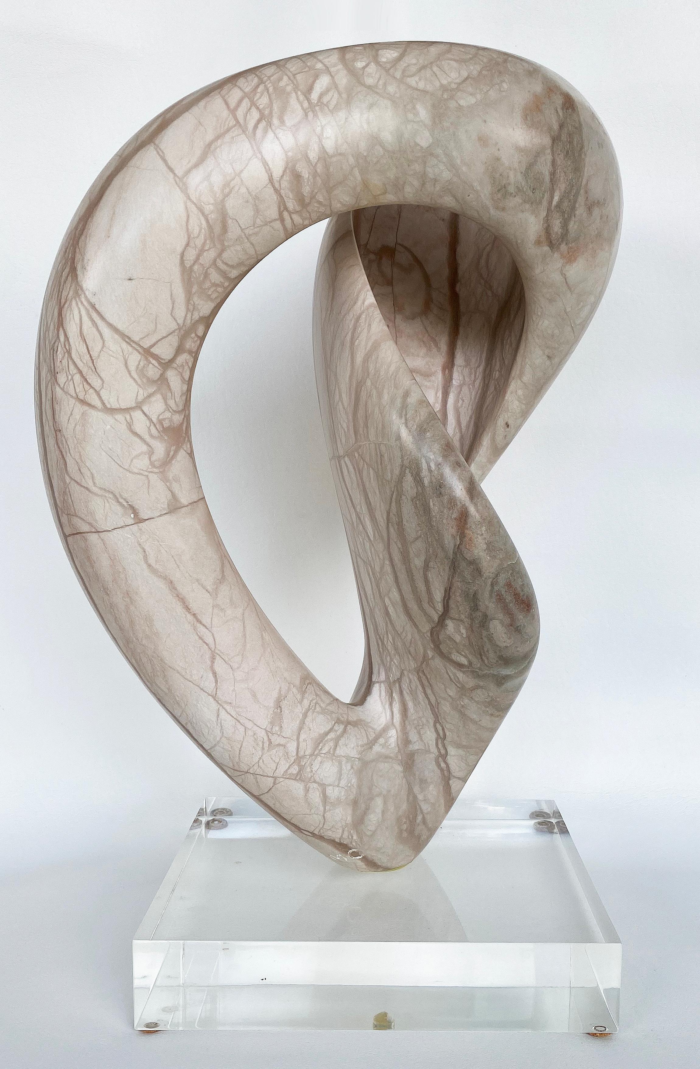 Free-form Abstract Veined marble sculpture Signed SMO on a Lucite base

Offered for sale is a free-form abstract veined marble sculpture atop a lucite base. It is signed SMO on the base of the sculpture. This is a large and decorative sculpture
