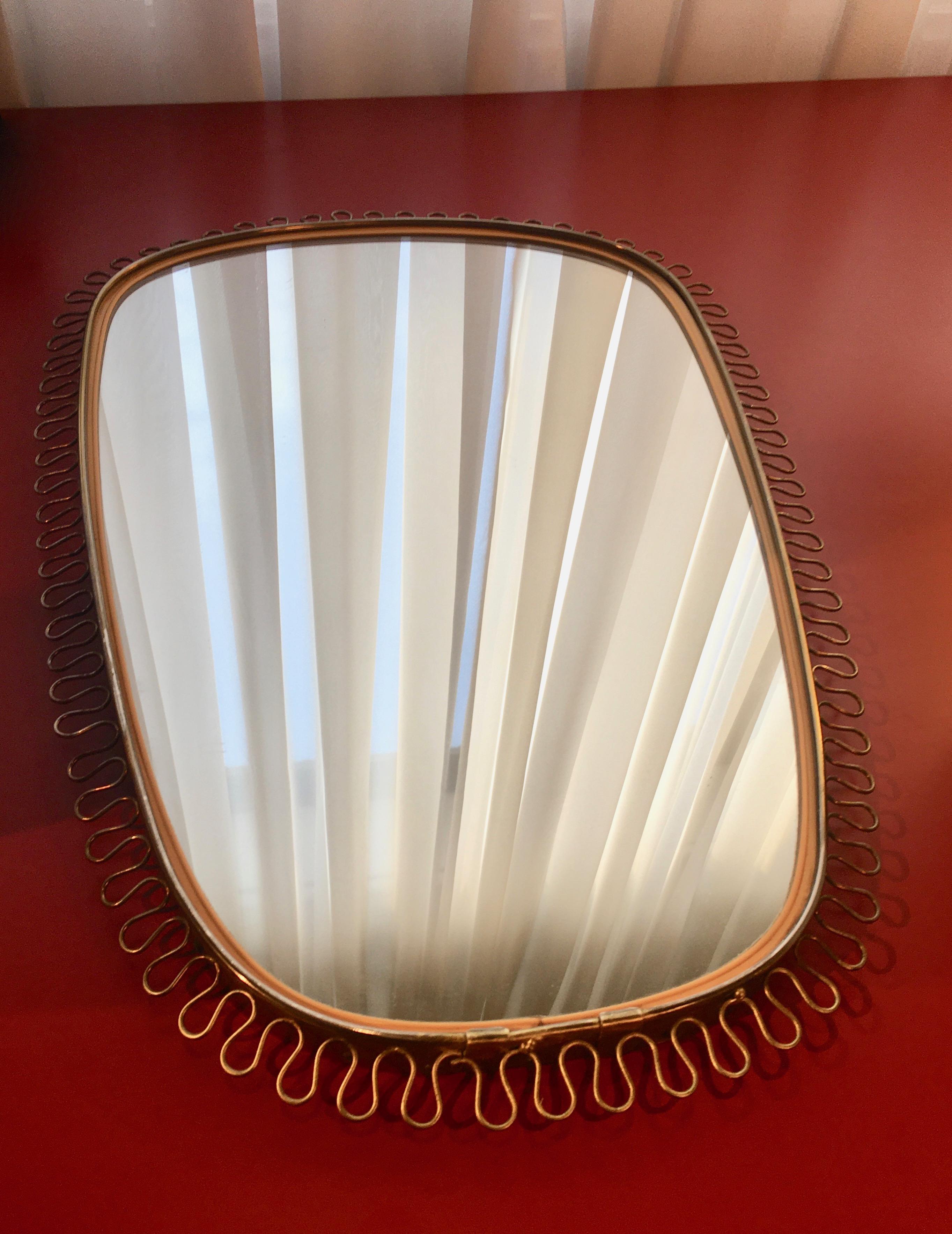 Ovoid wall mirror produced by Svenskt (Sweden), circa 1950.
Stamped on the back side.
Designed by Josef Frank.