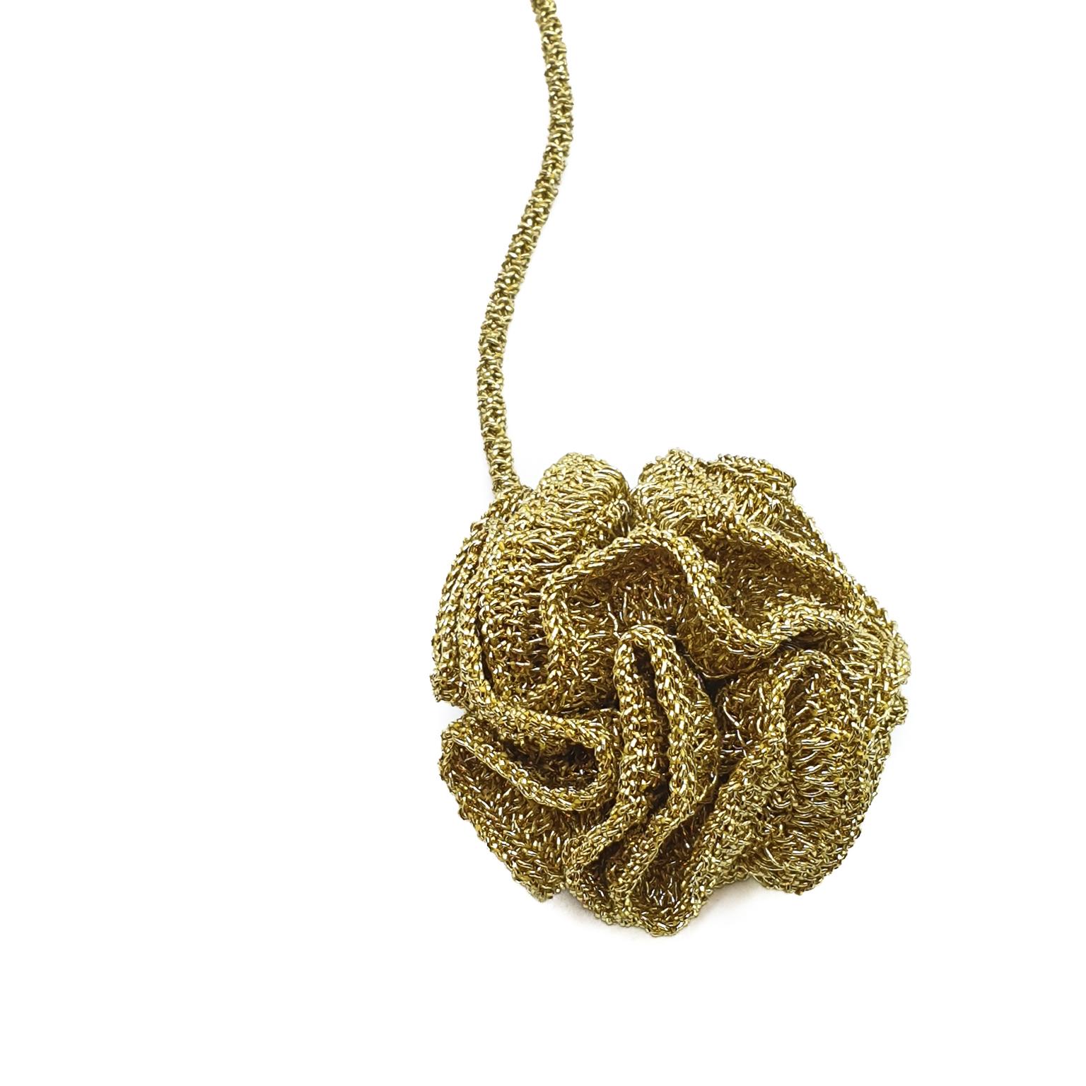 This is a free form crochet coral necklace. It is delicate and yet makes a statement.

This necklace can be custom made. 

The necklace is crochet with a smooth passing thread. It is a cotton thread coated with a gold color polymer. It has no metal