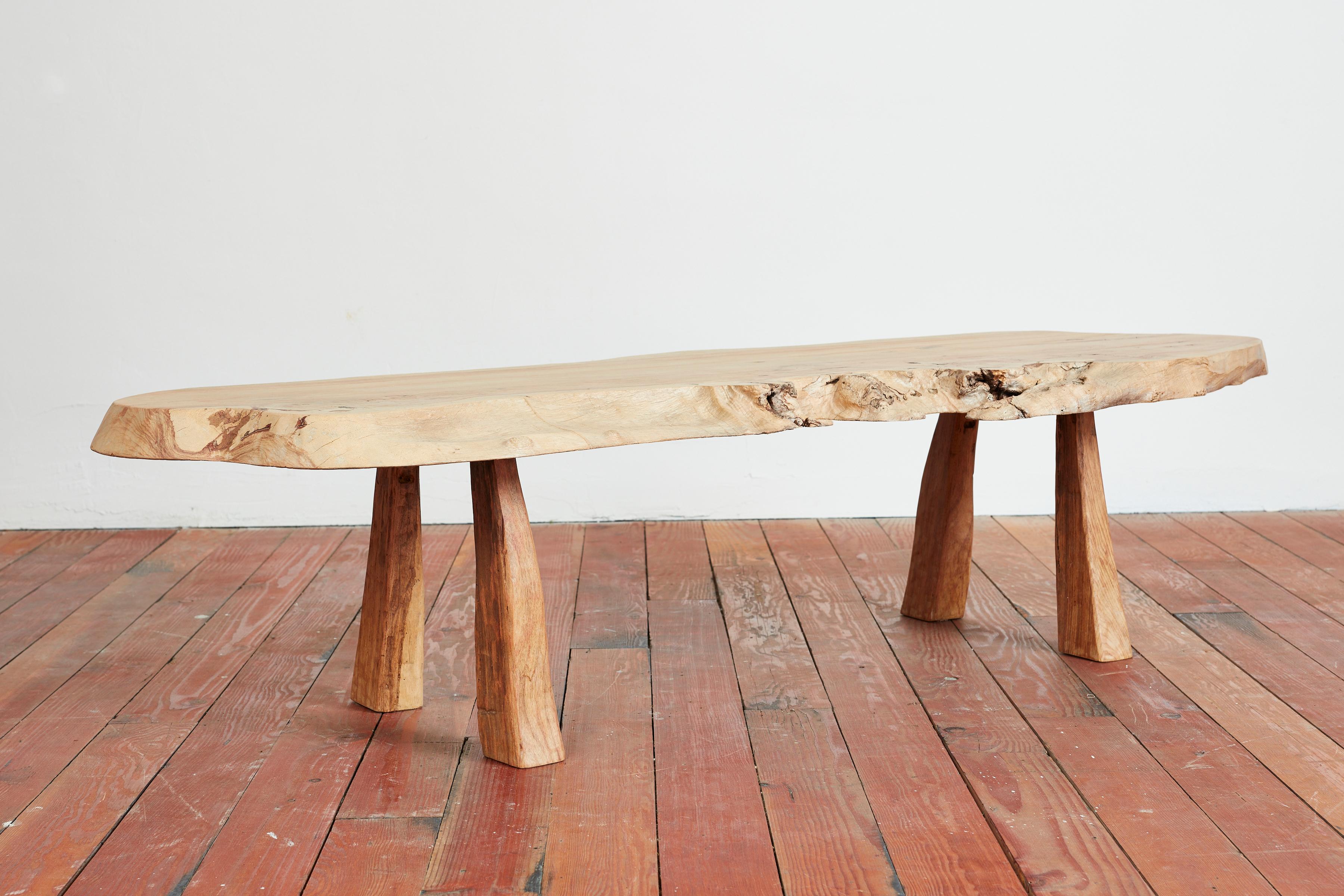 Thick olive wood bench - France, 1950s
Brutalist design with raw edge and wonderful grain to wood 
Functional as a bench or coffee table with smooth top surface.