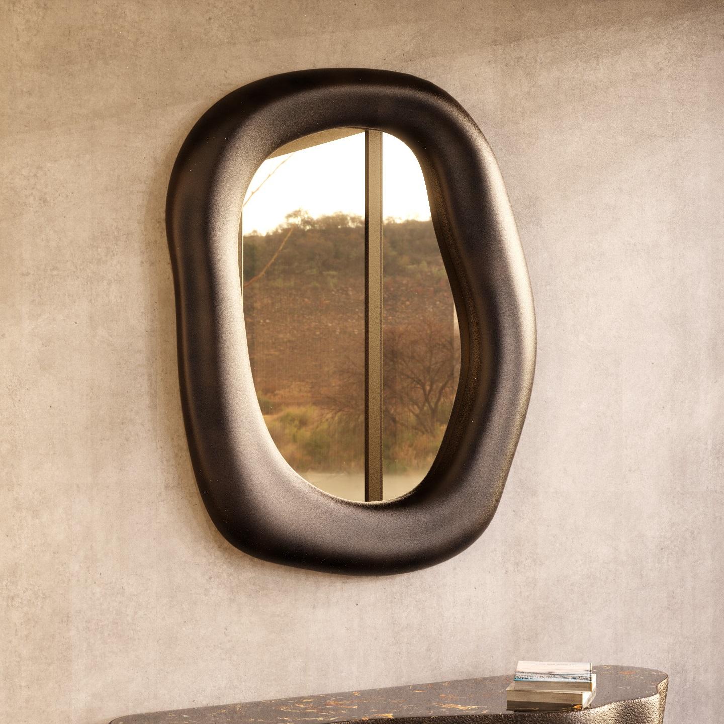 Contemporary wall mirror featuring organic shaped frame crafted of fiberglass and resin composite. Meticulously handmade by skilled artisans one piece at a time.
Pictured materials: Rust color on Rust texture and copper bronze mirror.
Custom sizes