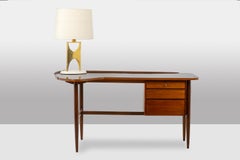 Bureau en teck de forme libre. 1950s.