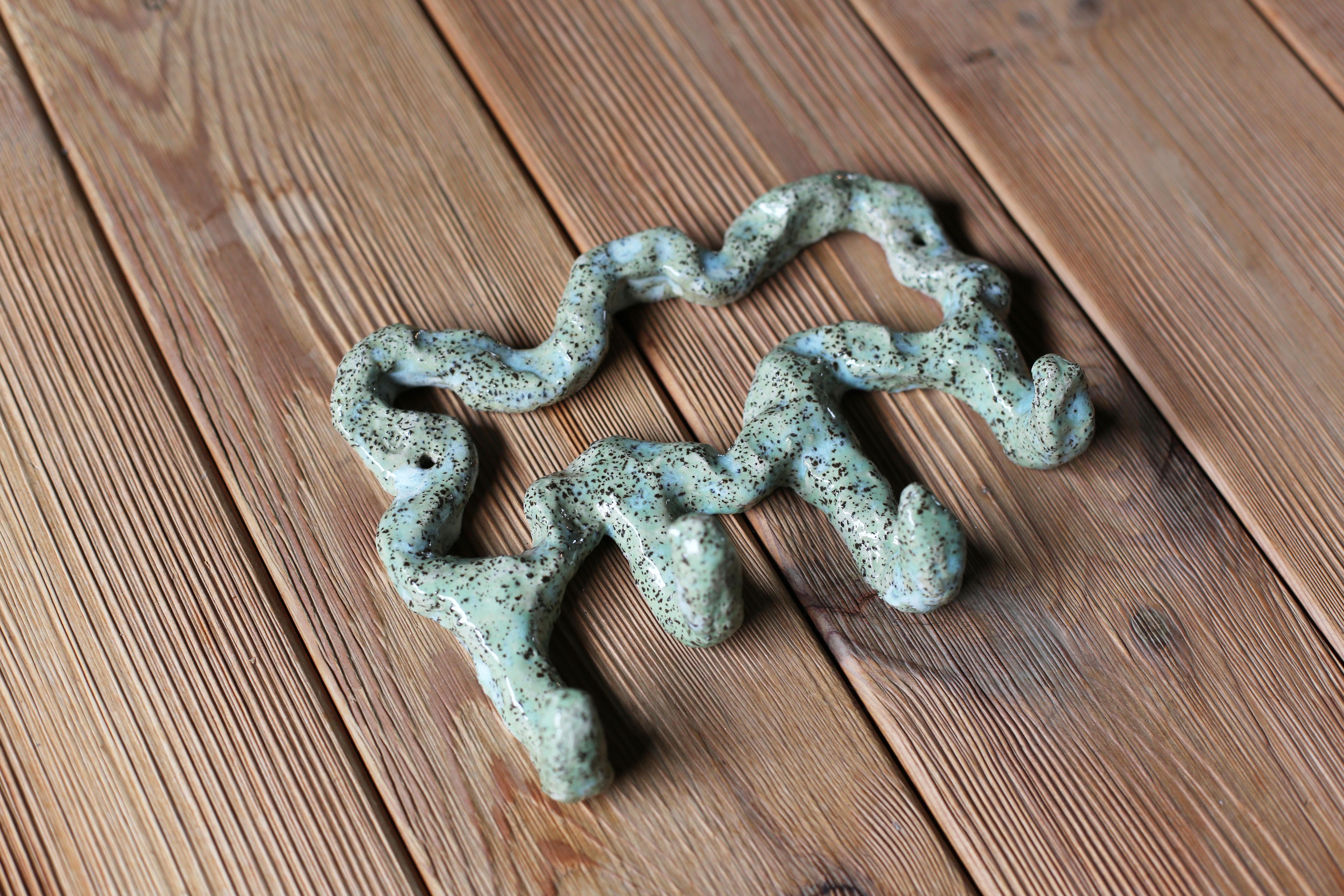 Modern Free Form Wall Hook in Stracciattella Clay and Pastel Green Glaze
