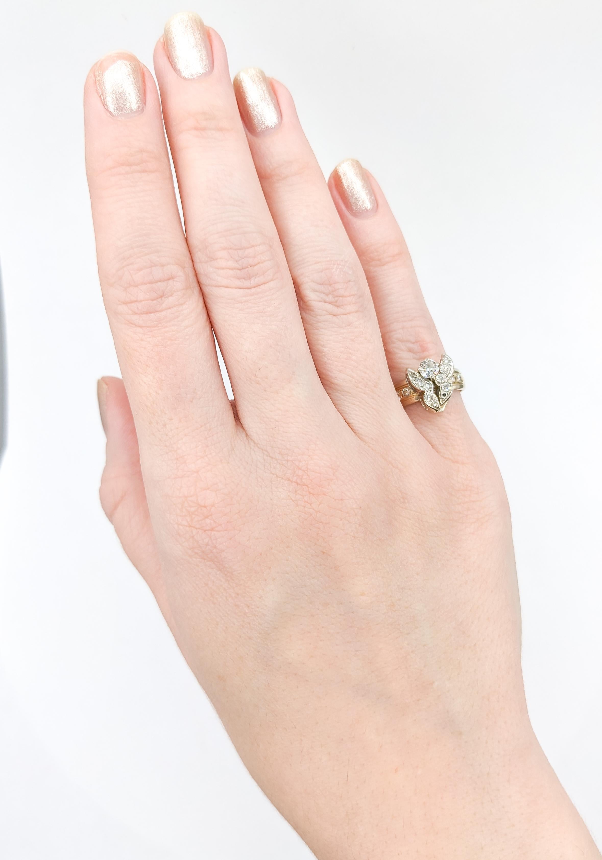 Free Form Wings Diamond Two-Tone Custom Ring

Elevate your style to new heights with our exquisite ring, masterfully crafted in the elegant contrast of 14k white and yellow gold. This captivating piece is adorned with a total of 0.50 carats of round