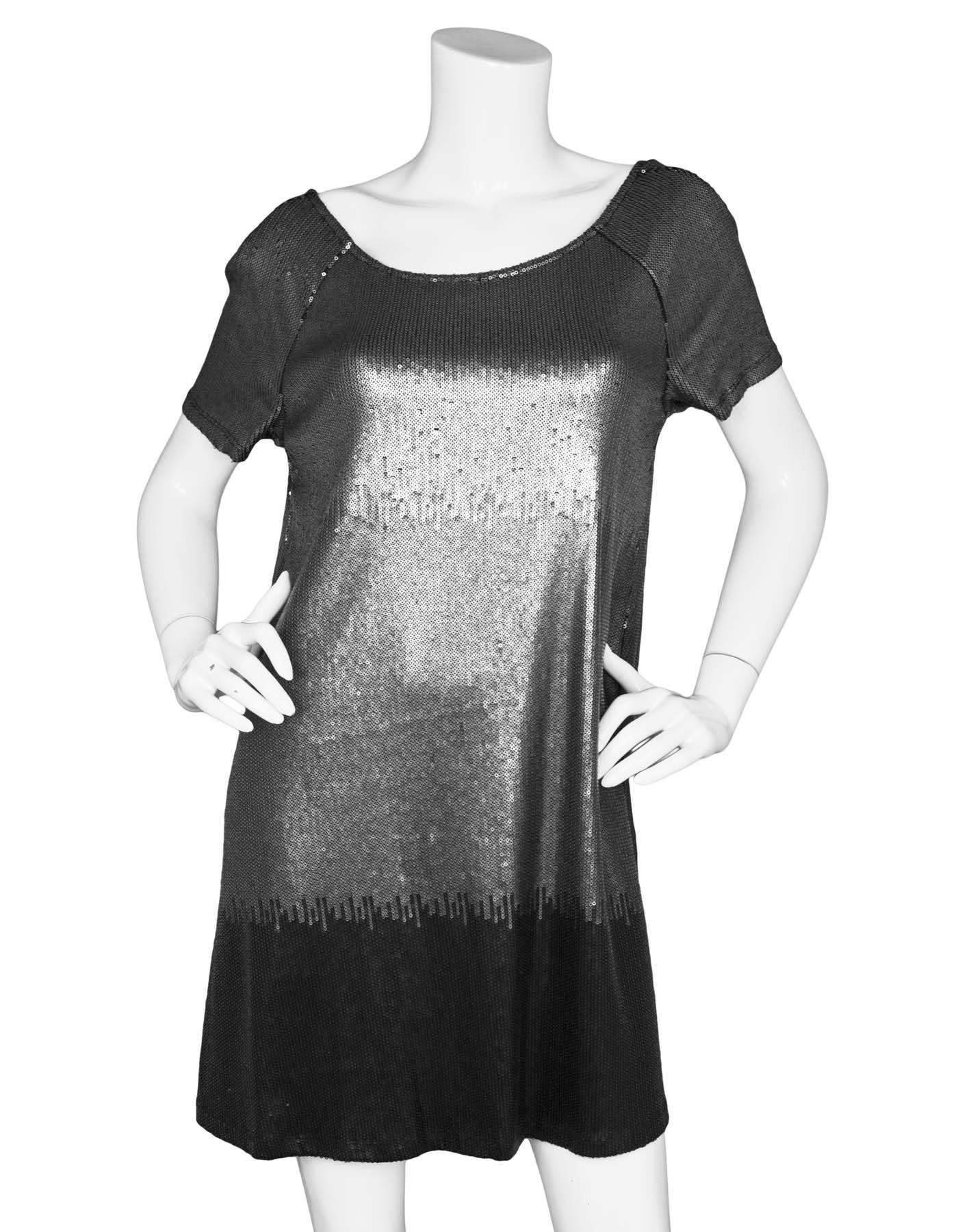 Free People Black & Grey Sequin Ombre Dress Sz S

Features low back

Made In: China
Color: Black, grey
Composition: 62% polyester, 35% rayon, 3% spandex
Lining: Black textile
Closure/Opening: Pullover
Exterior Pockets: None
Interior Pockets: