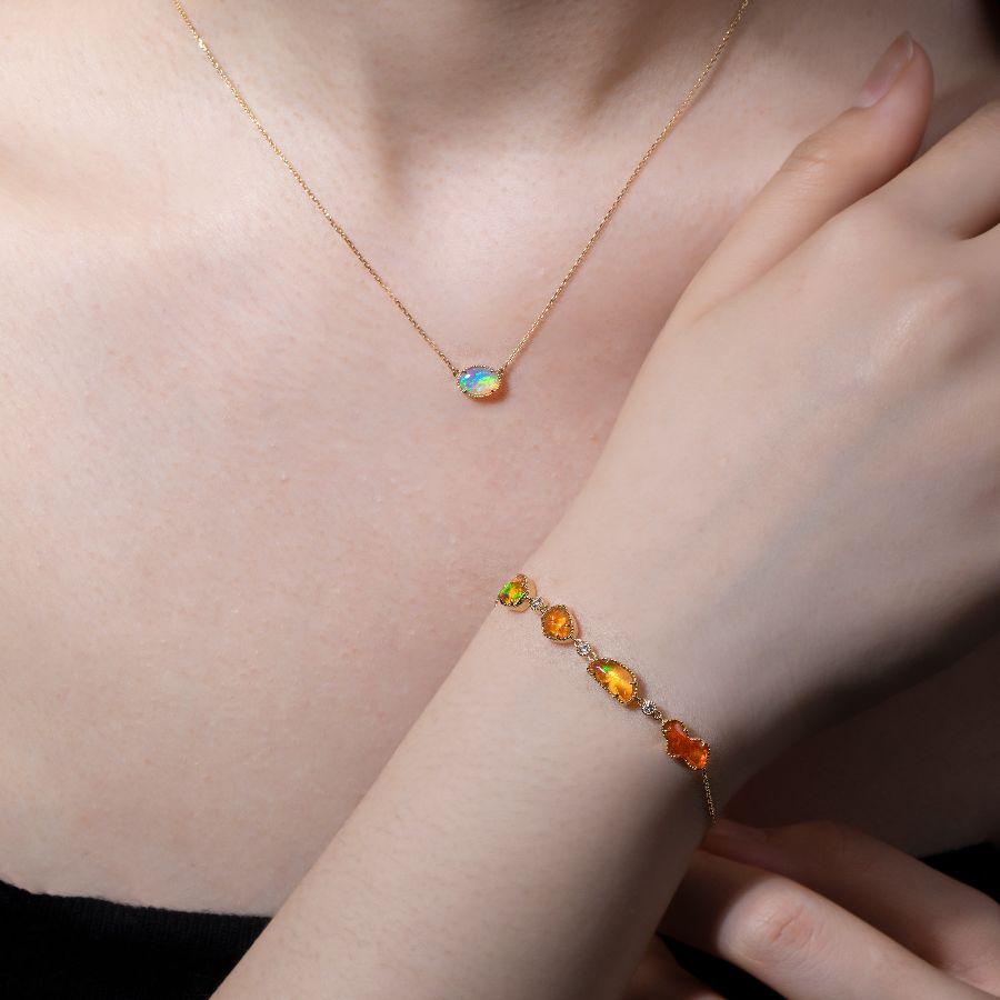 Free Shape Mexican Fire Opal Diamond Bracelet in 18K Yellow Gold.


Free Domestic USPS First Class Shipping!  Free One Year Limited Warranty!  Free Gift Bag or Box with every order!



Opal—the queen of gemstones, is one of the most beautiful and