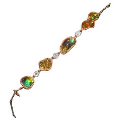 Bracelet en or jaune 18 carats avec opale du feu du Mexique de forme libre et diamants