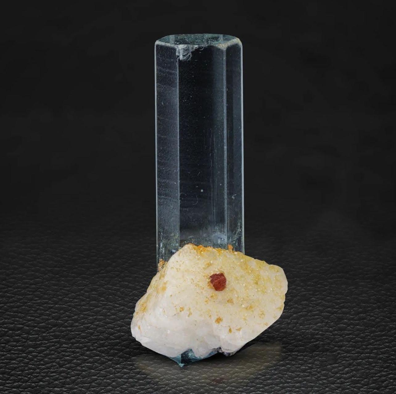 Product Information:

Specimen Name: Aquamarine on Albite with Spessertine Garnet

Weight: 6 grams

Dimension: H: 3.4 x W: 1.7 x D: 1.4 cm

Treatment: None

Origin: Skardu District, Gilgit Baltistan Province, Pakistan  

Description:

This stunning