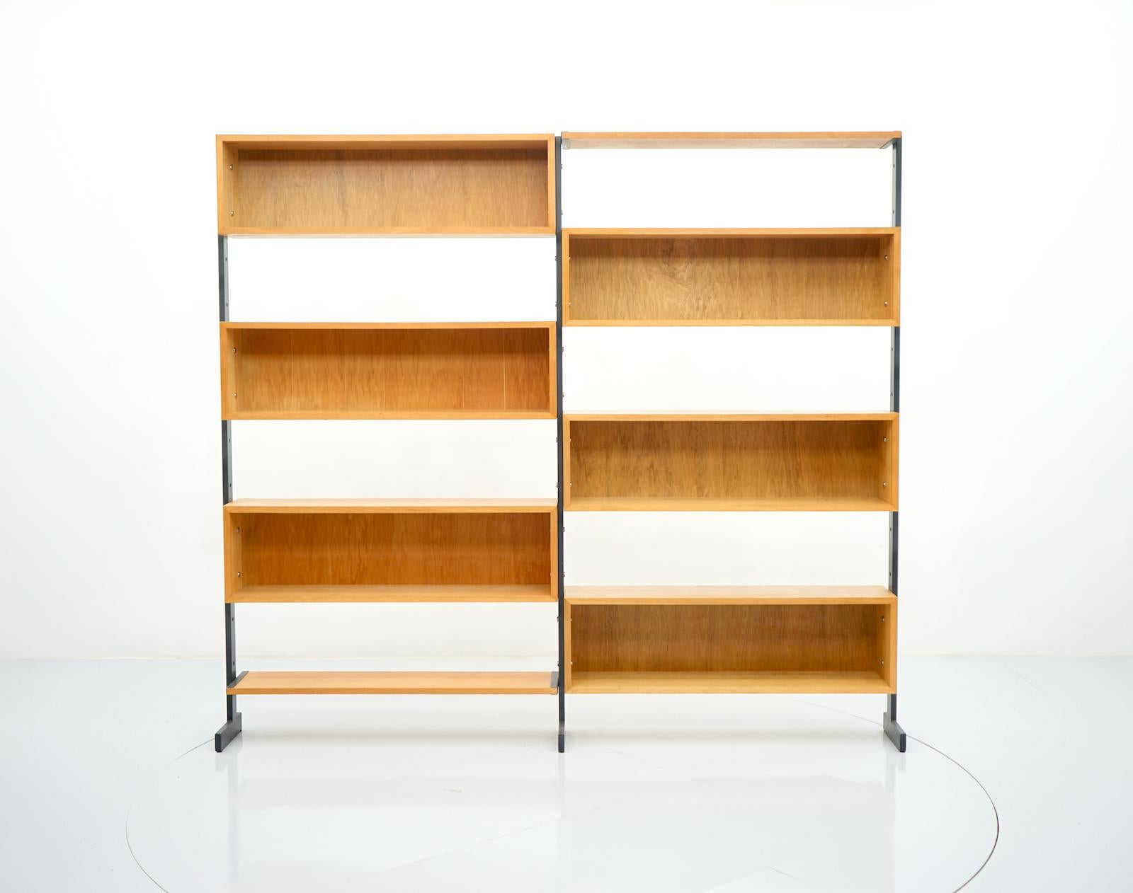 Bookcase free standing shelf, oak and metal Germany 1960s. 6 large cabinets and 2 shelves. Can be set up individually. Very good quality, very good condition.

Measurements Cabinets: D 22 cm, H 32 cm, W 109 cm 
Shelves: D 22 cm, W 109 cm.