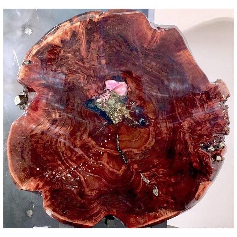 This Wall-mounted one of a kind crystal and gemstone work is set into the finest Claro Walnut Wood. It's crystal & gemstone inlays include rare specimens of Gemmy Cabalto Calcite, Rhodonite, Black Tourmaline, rare Pyrite cubes, Pyrite clusters and