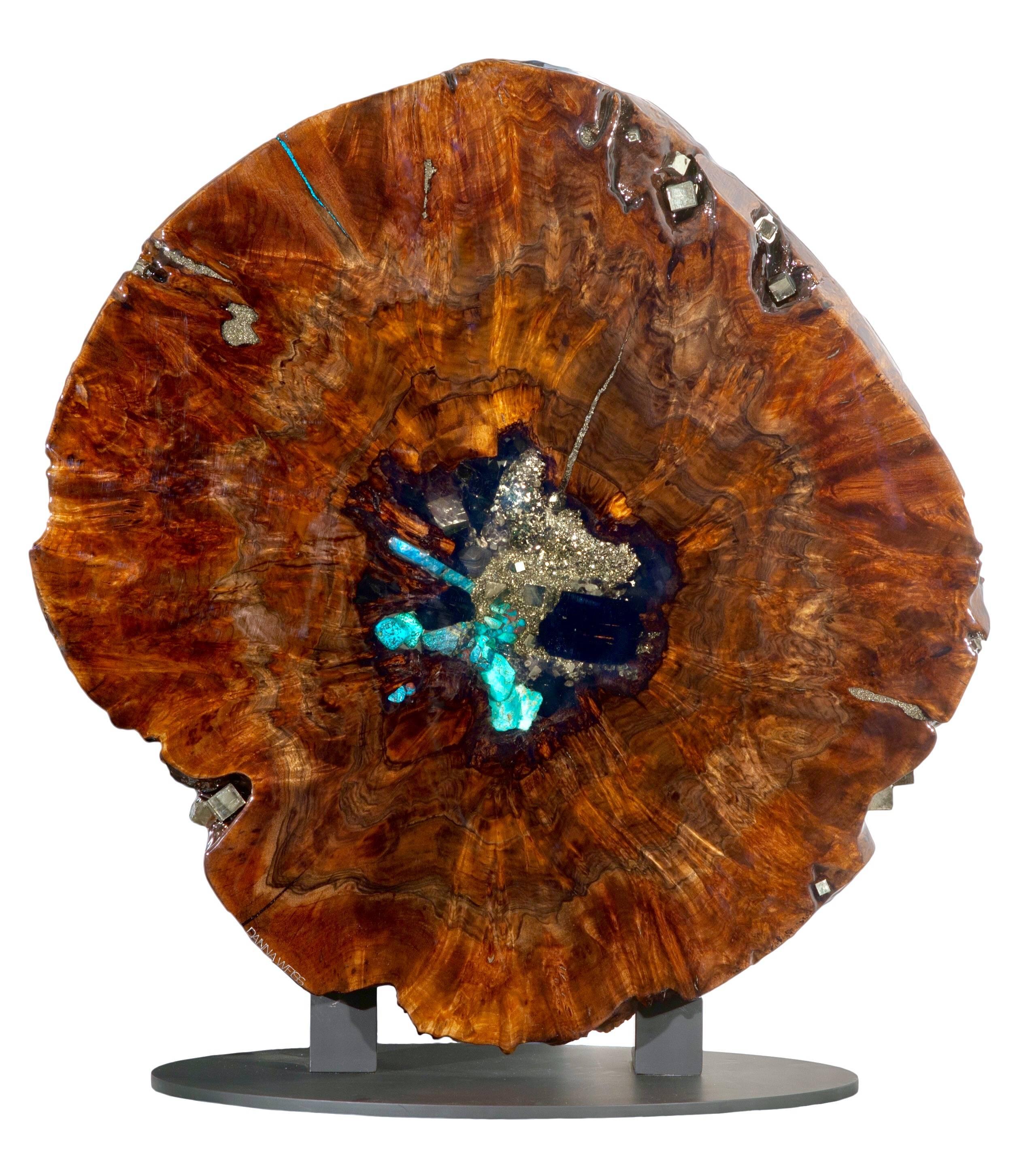 Wall-mounted Caro Walnut sculpture with crystal and gemstone inlay. Stone contents include black tourmaline and turquoise. See Danna Weiss store.  