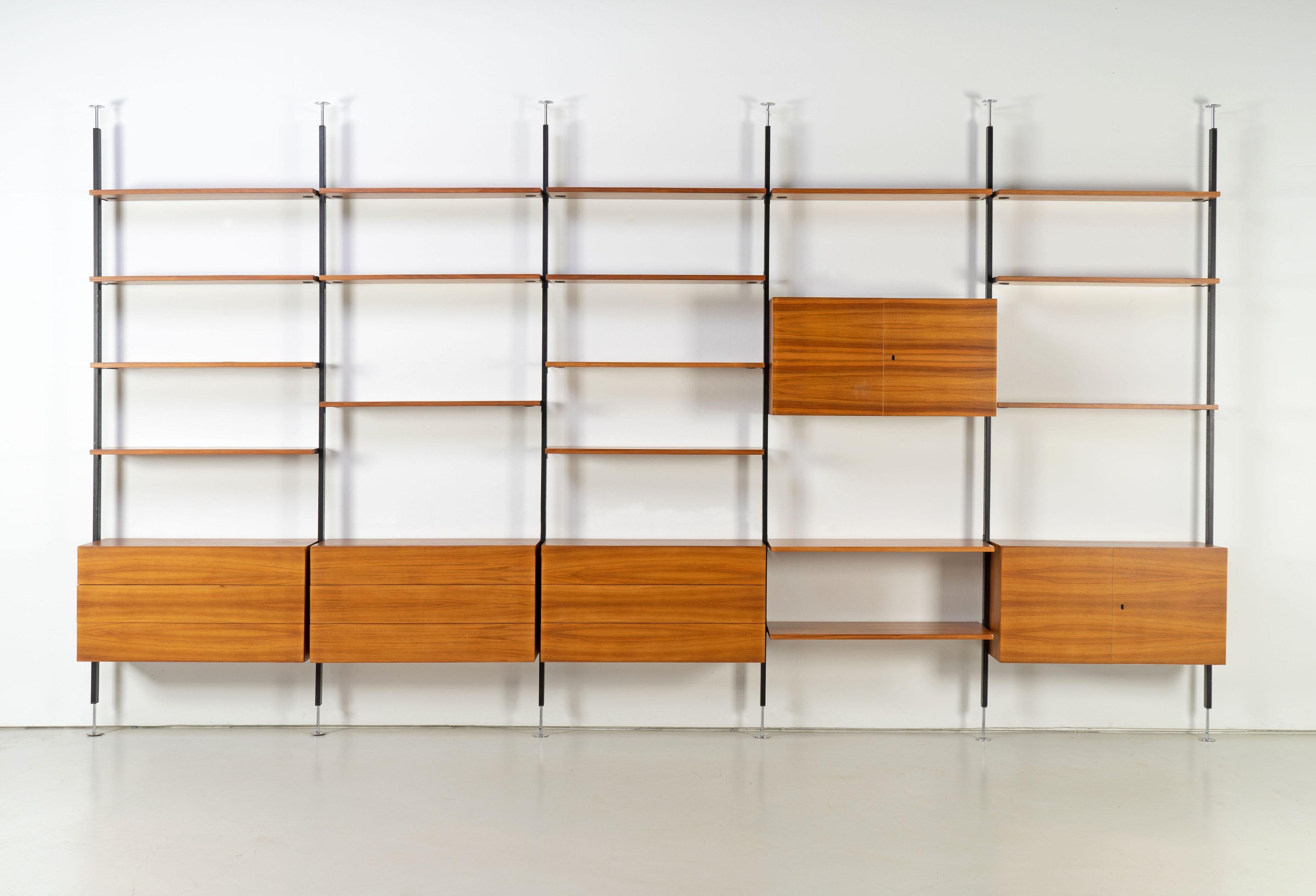 Rare free standing wall-unit designed by Ulrich P. Wieser for Bofinger - Wohnbedarf AG, Switzerland in 1958. Height adjustable and veneered with beautiful walnut (also backside).