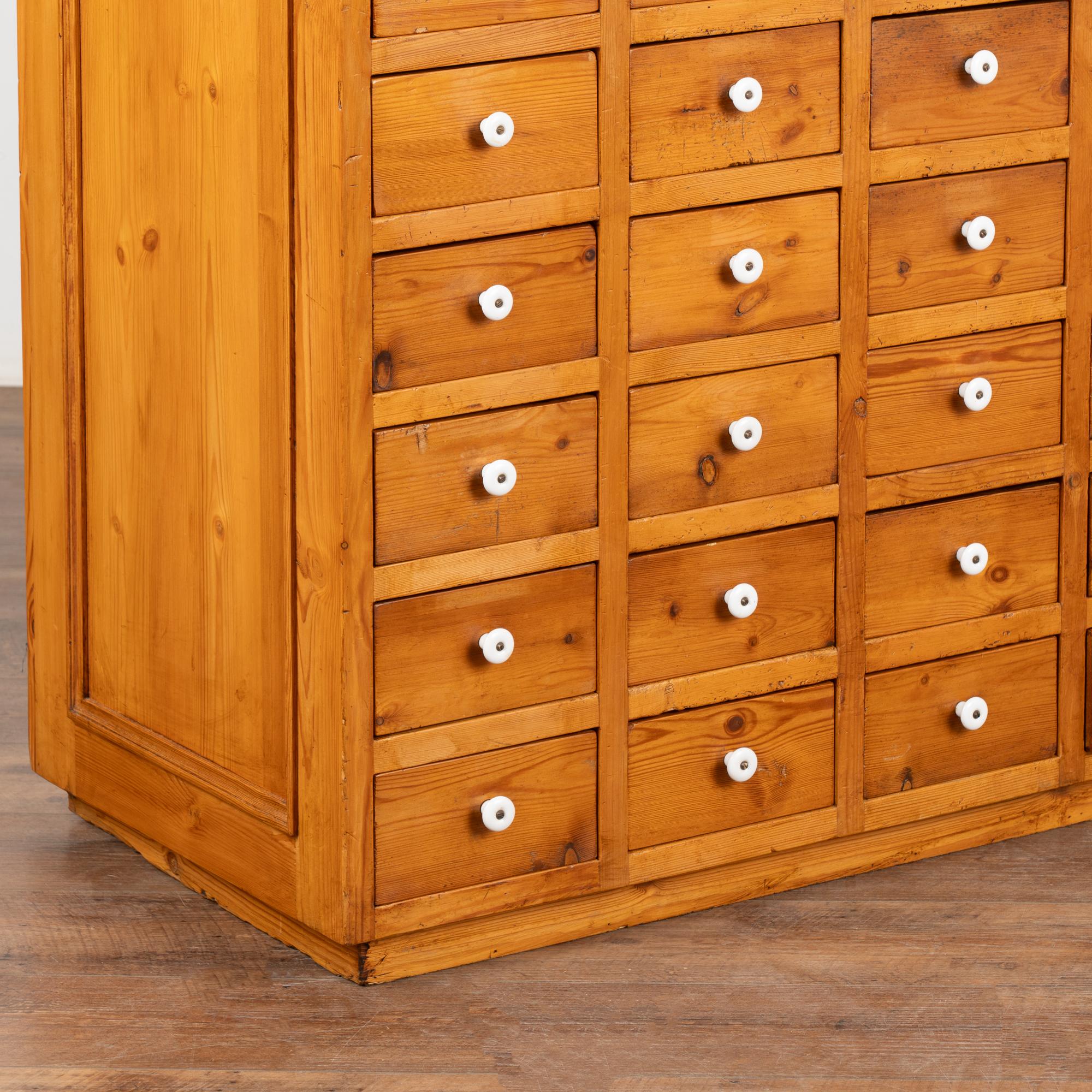 20th Century Free Standing Pine Apothecary Counter with 64 Drawers, Kitchen Island circa 1900 For Sale