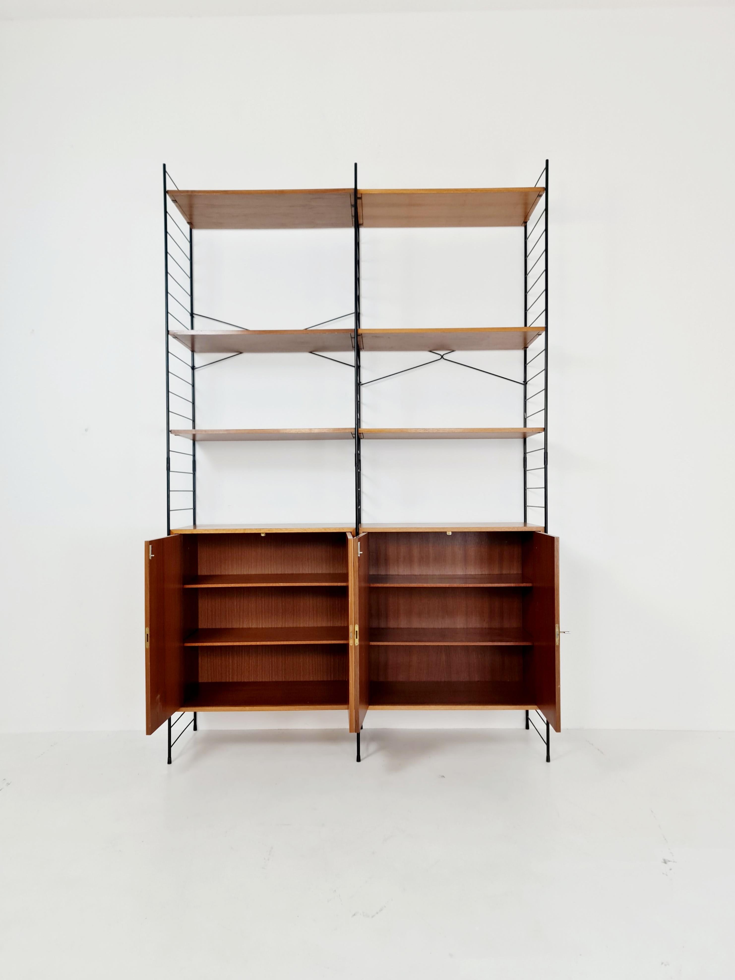 Mid-Century Modern Free Standing String Shelving System, Teak Bookcase with Cabinet by Whb Germany For Sale