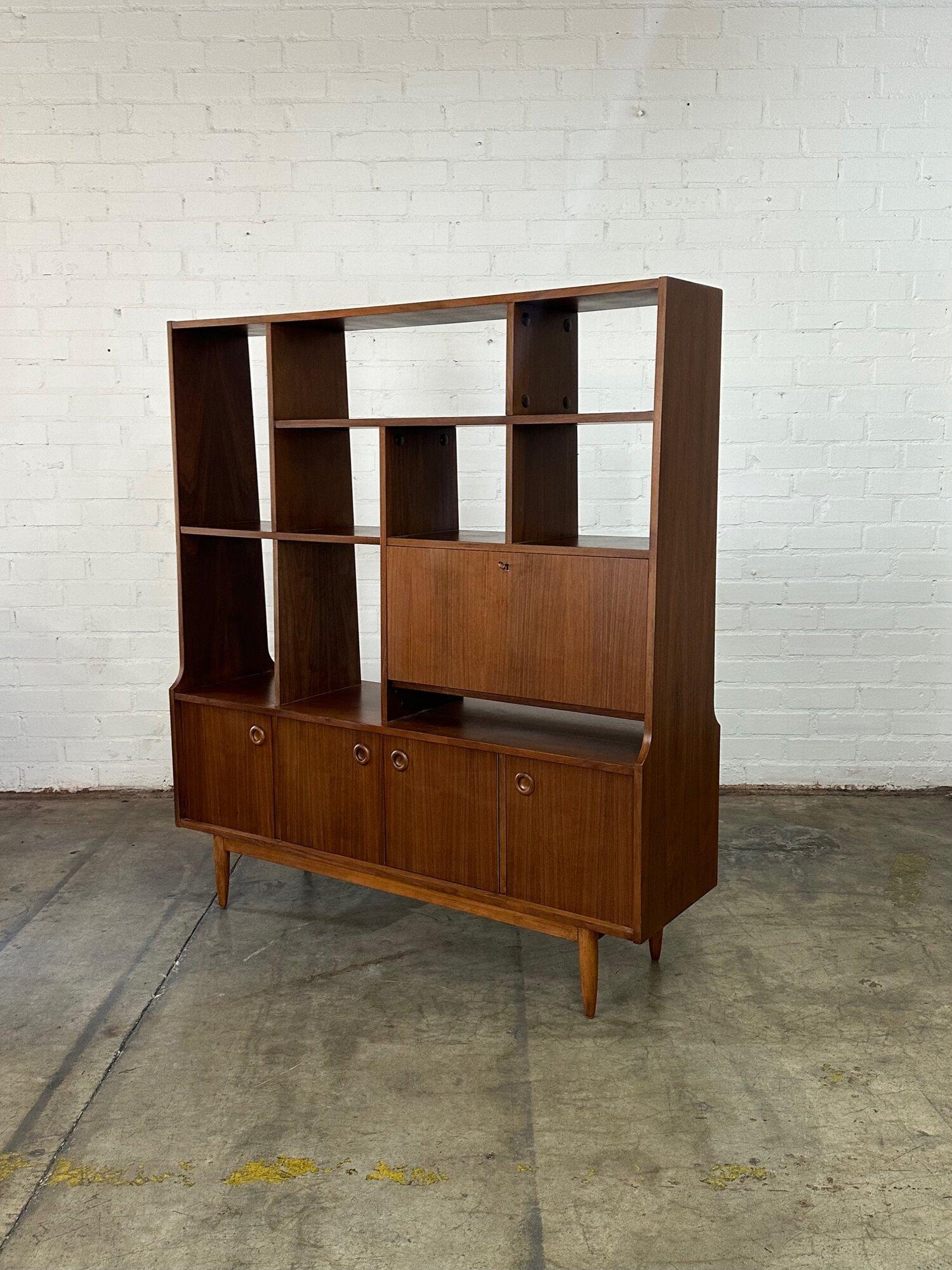 W61 D17.5 H66.25

10-21.5 shelf heights

Fully restored storage unit that can serve as a few different things. Great to use as a room divider or free standing wall unit. Item has been inspected and restored structurally by our in house carpenters