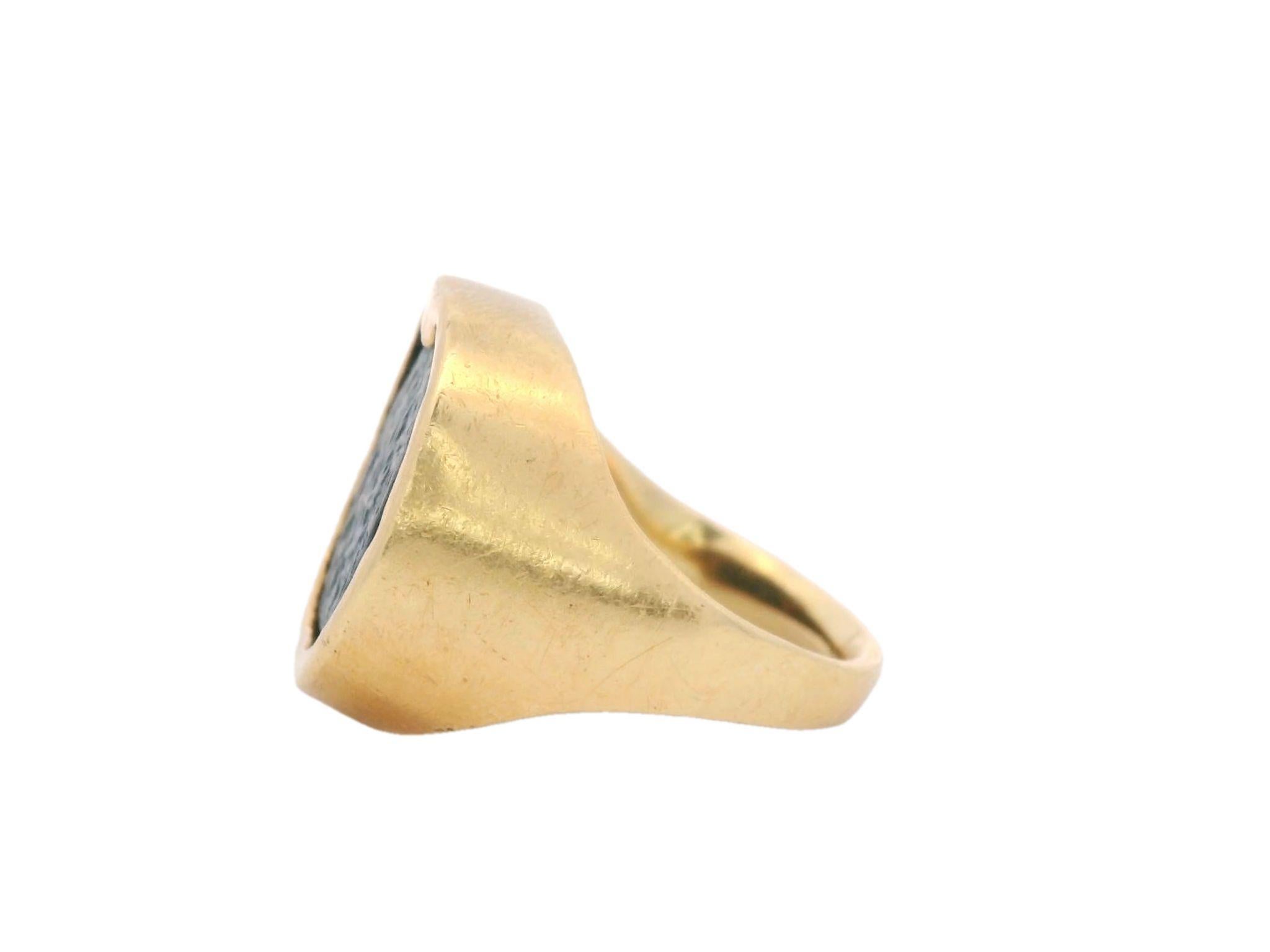 Ancient Coin Ring with First Jewish Revolt Coin in 18K Gold

This Ancient Coin Ring, featuring a possible First Jewish Revolt coin, is a remarkable blend of history and design. Made from 18k yellow gold, the ring showcases an ancient motif with a