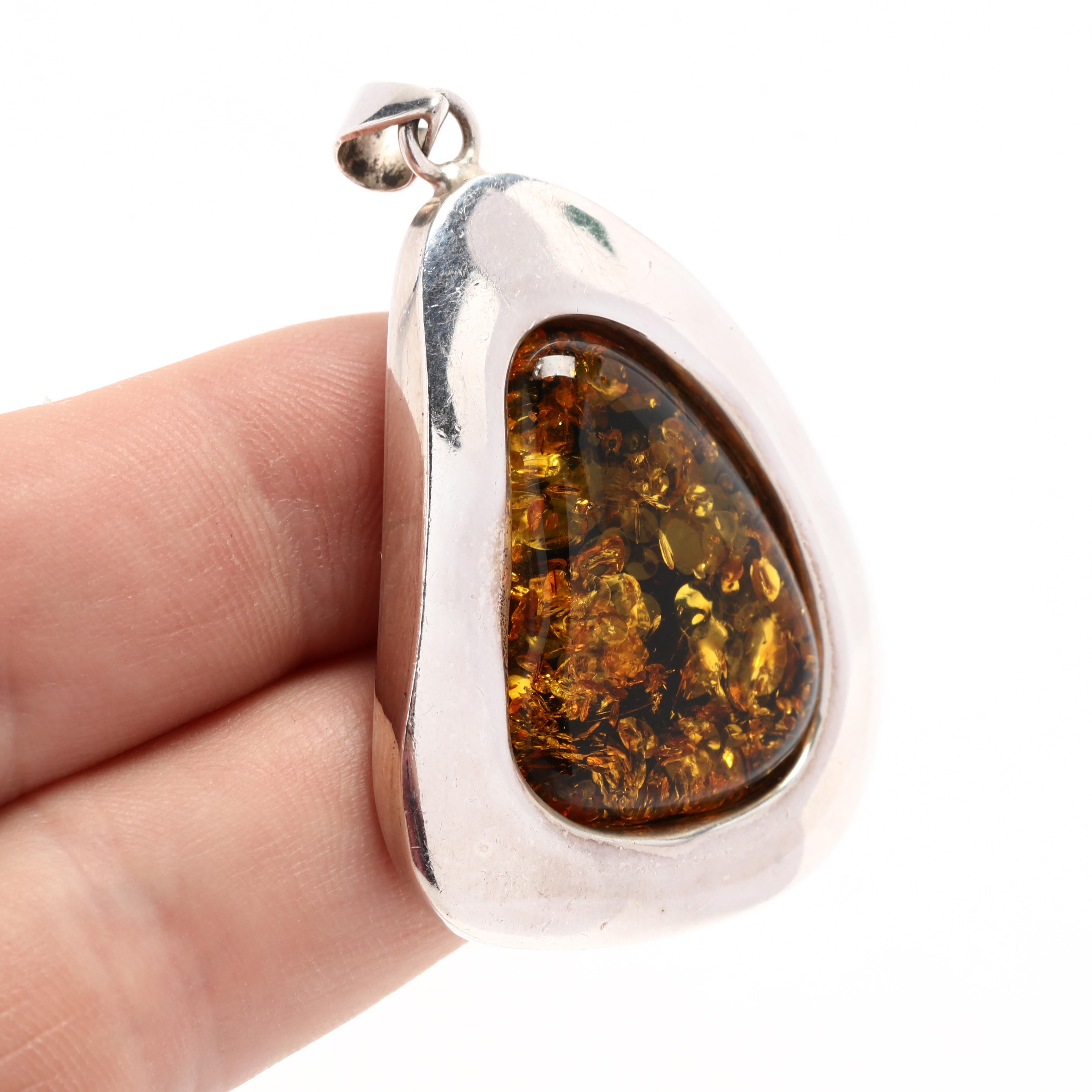 Freeform Amber Pendant, Sterling Silver, Amber Pendant In Good Condition For Sale In McLeansville, NC