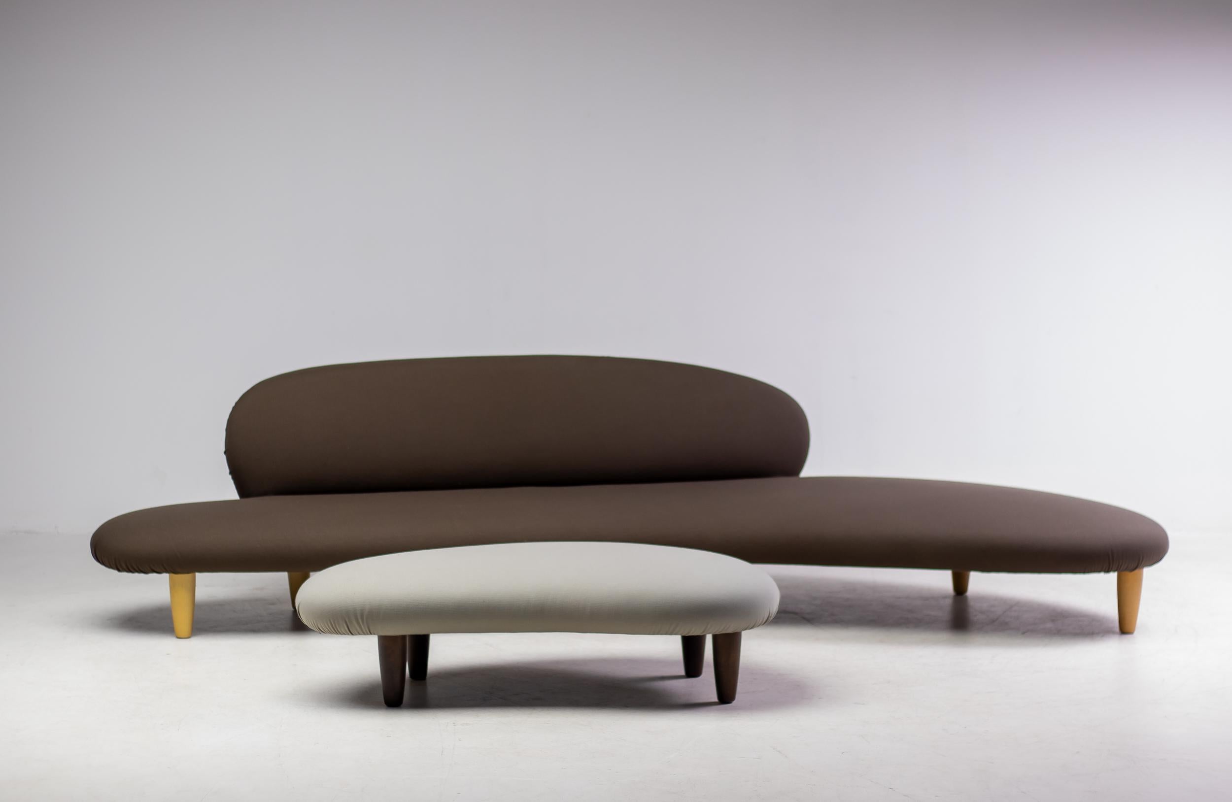 The sculptural quality of Noguchi's design vocabulary finds expression in the Freeform Sofa: it is entirely different from other designs of the same period, appearing in combination with the Ottoman like an enlarged sculpture of flat, rounded river