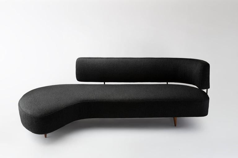 A rare freeform sofa by the Japanese designer Taichiro Nakai, in cherry wood, black lacquered metal and flecked fabric (Pierre Frey), manufactured by La Permanente Mobili, Italy.
The model was designed for and shown during the exhibition “La Mostra