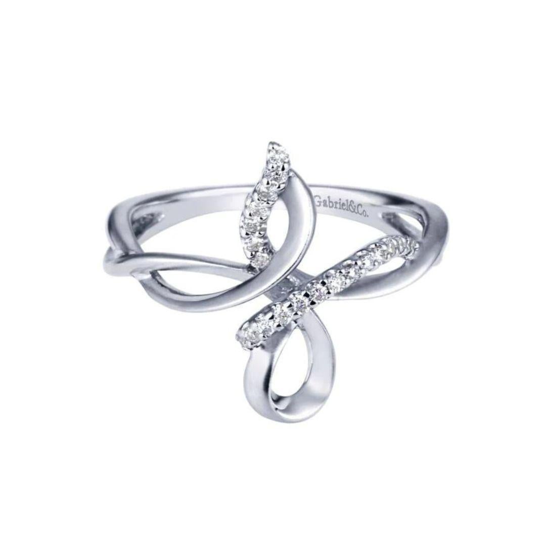 Ladies' Sterling Silver and Diamonds Fashion Ring. Vertical stylized infinity design weaves through diamond pave and satin finish. Total carat weight of diamonds is 0.13 ctw, H color, SI clarity. 
