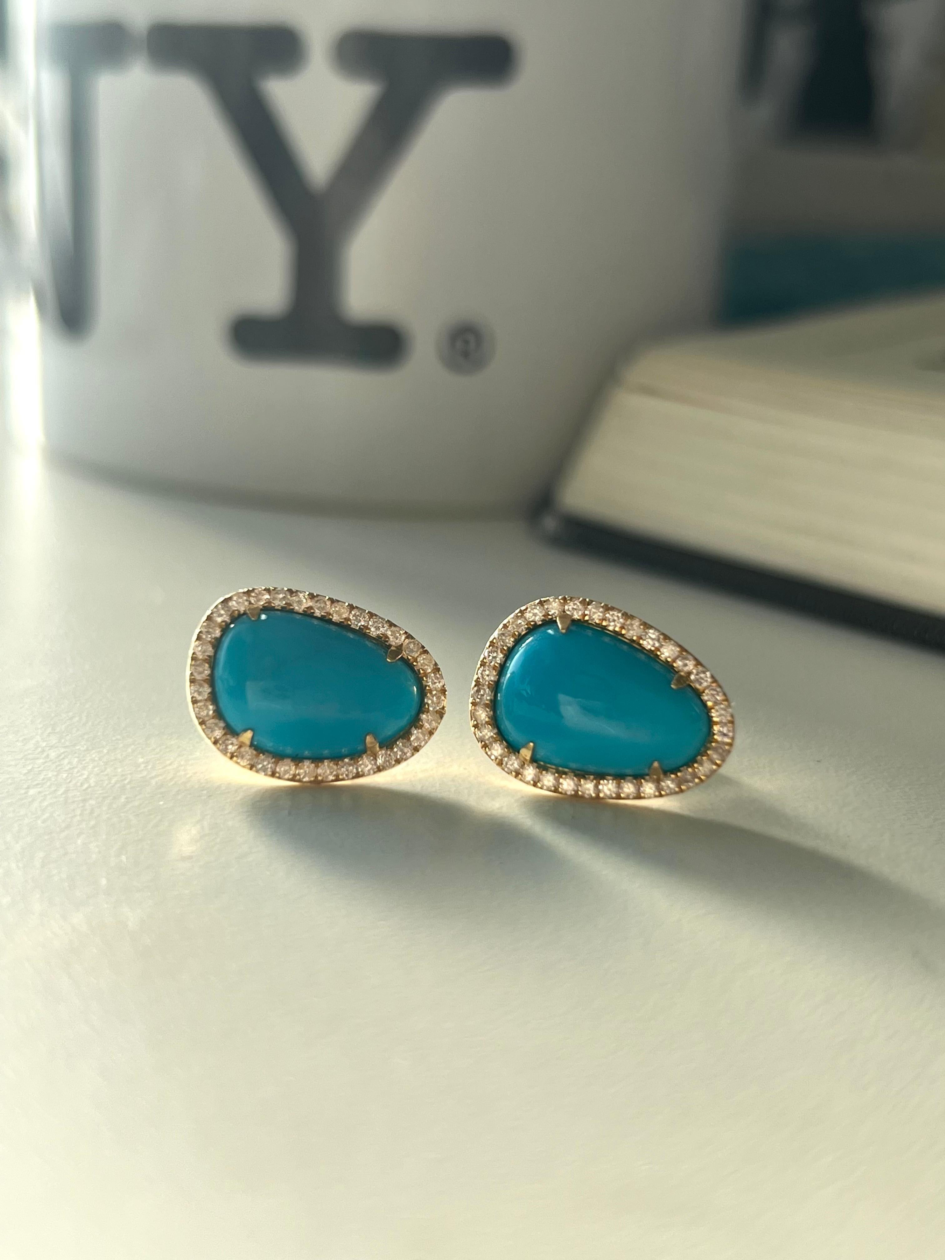 18K yellow gold earrings with freeform shape turqouise and diamonds

Features
18K yellow gold
.48 carat total weight round diamonds
5.82 carat total weight turquoise
Post earrings with push backs
Turquoise shape is organic and do not match each