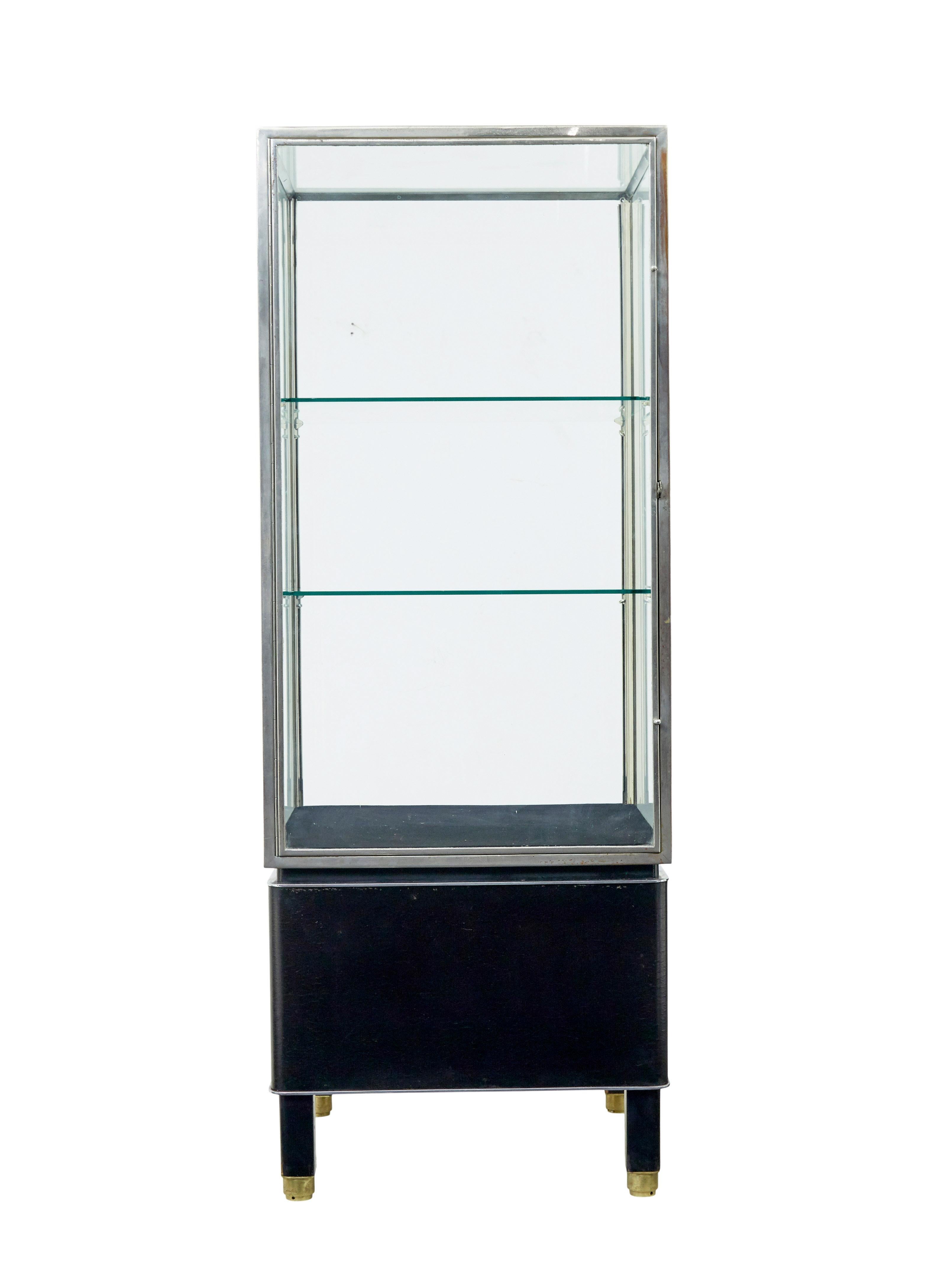 Swedish Freestanding Art Deco steel and leather glazed display cabinet For Sale