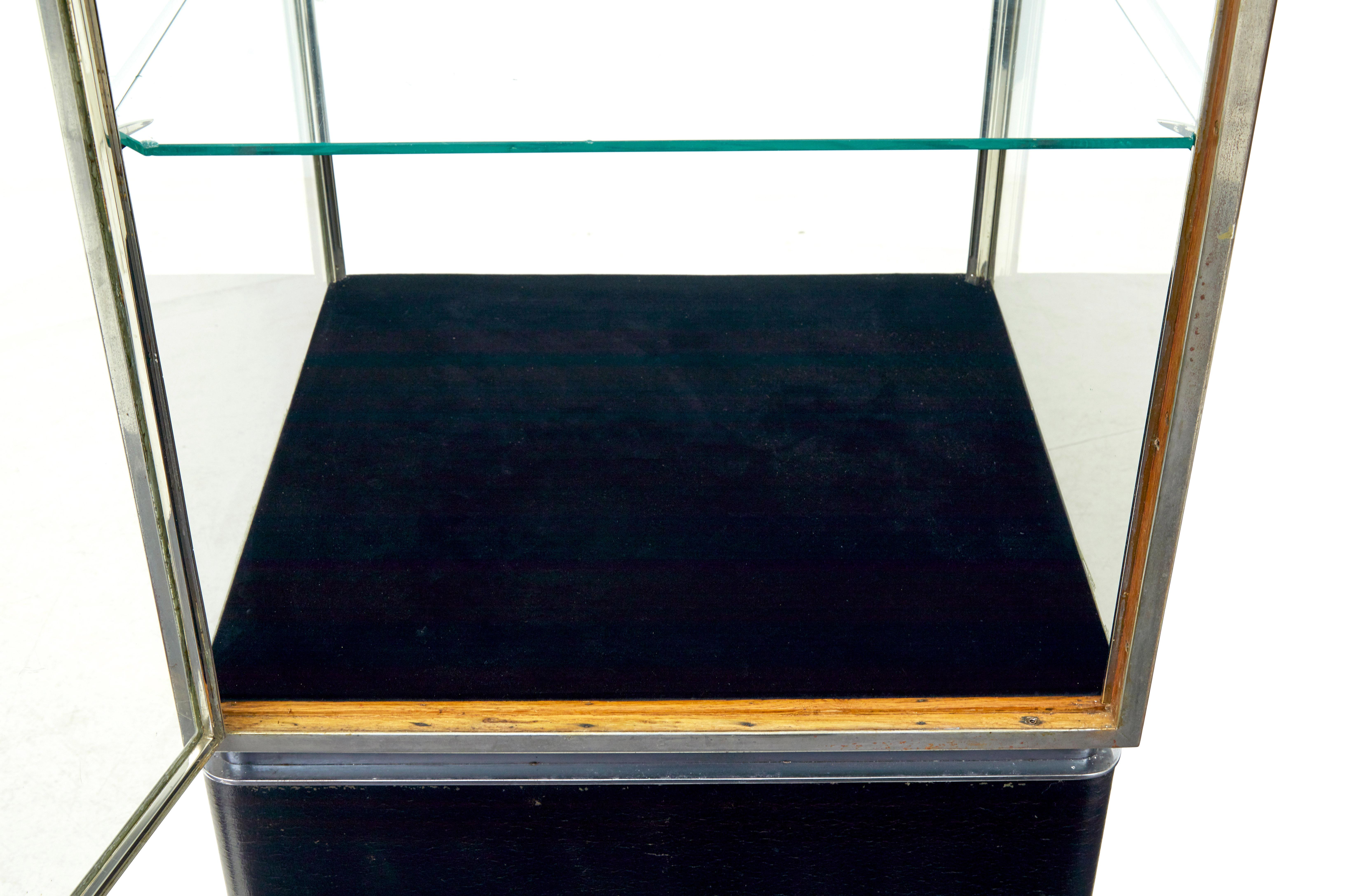Steel Freestanding Art Deco steel and leather glazed display cabinet For Sale