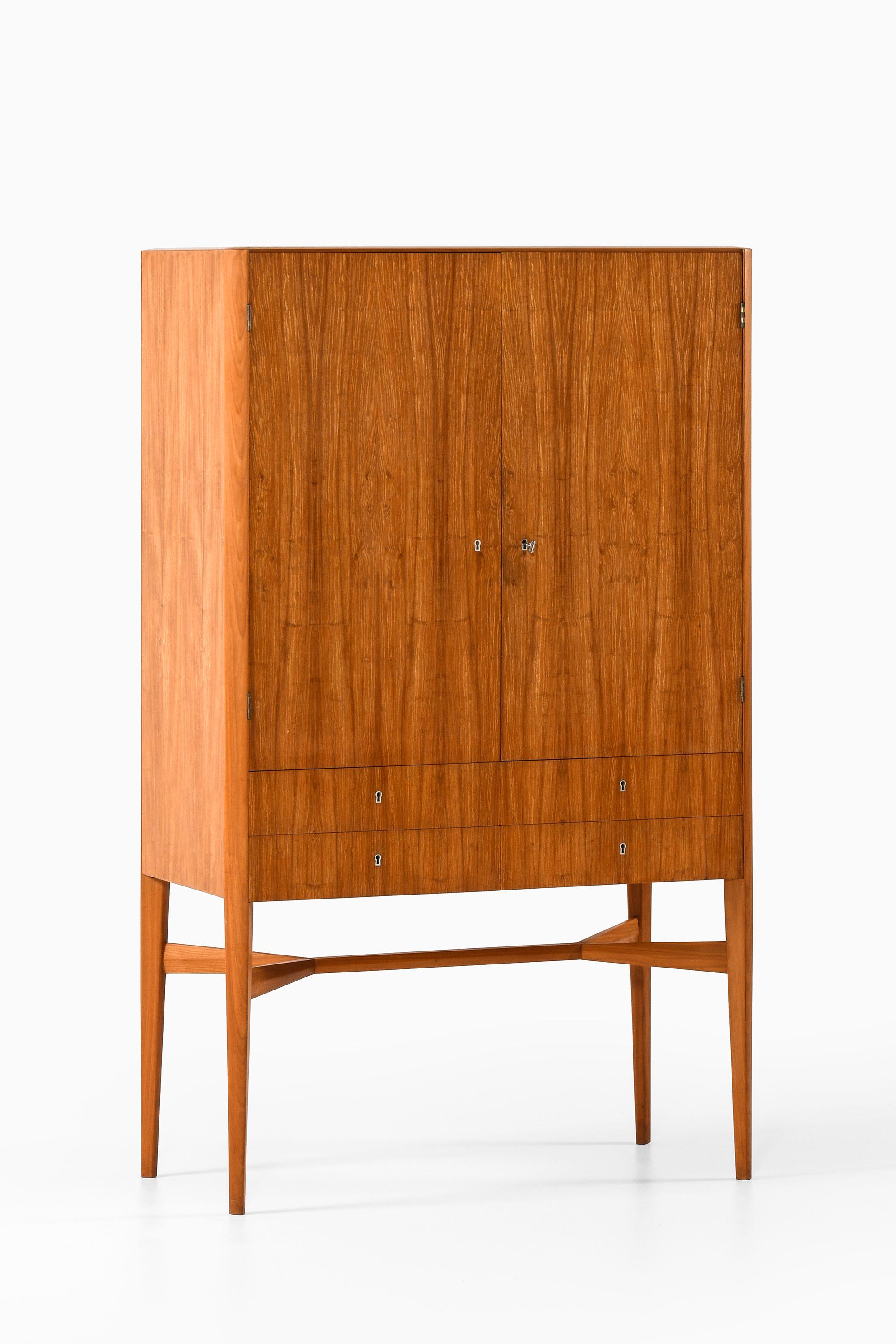 Freestanding Cabinet in Teak by Carl-Axel Acking, 1940s

Additional Information:
Material: Teak
Style: midcentury, Scandinavian
Produced in Sweden
Dimensions (W x D x H): 89.5 x 42.5 x 147.5 cm
Condition: Good vintage condition, with signs of