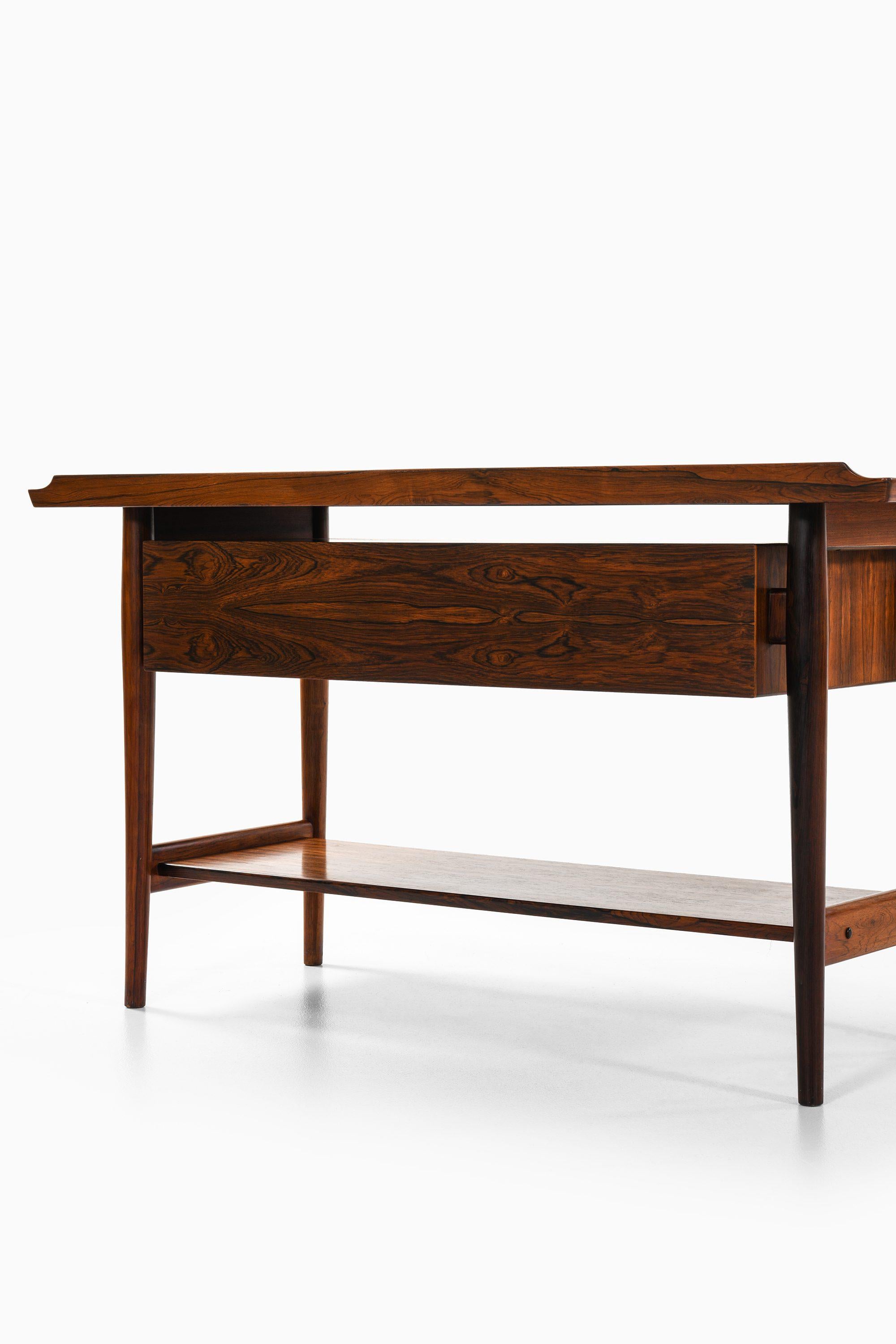 Danese Tavolo consolle indipendente in legno di palissandro e formica di Arne Vodder, anni '60 in vendita